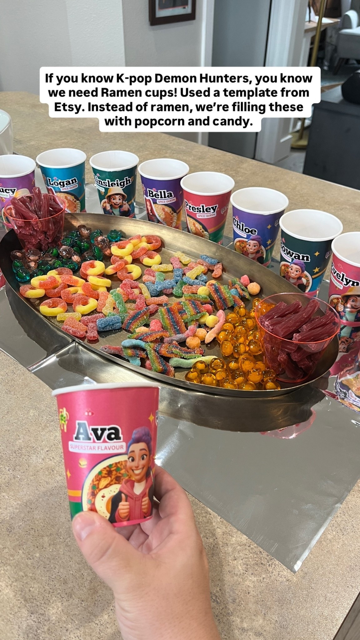 If you know K-pop Demon Hunters, you know we need Ramen cups! Used a template from Etsy to create the design with the names. Then I exported those as images and uploaded those images back into Canva using the 9oz cup wrapper template to size them to wrap around a cup. Printed at staples and attached with double sided tape. Instead of ramen, we’re filling these with popcorn and candy for Chloe’s KPop Demon Hunters birthday party.

#LTKKids #LTKParties #LTKFamily