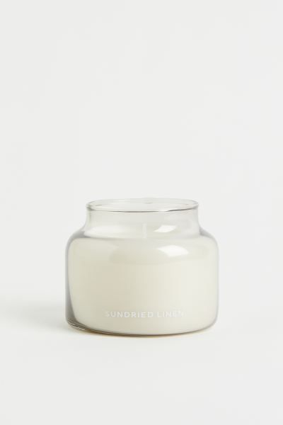 Scented candle in a glass holder. Holder can be used for storage or as a tealight holder when can... | H&M (US + CA)