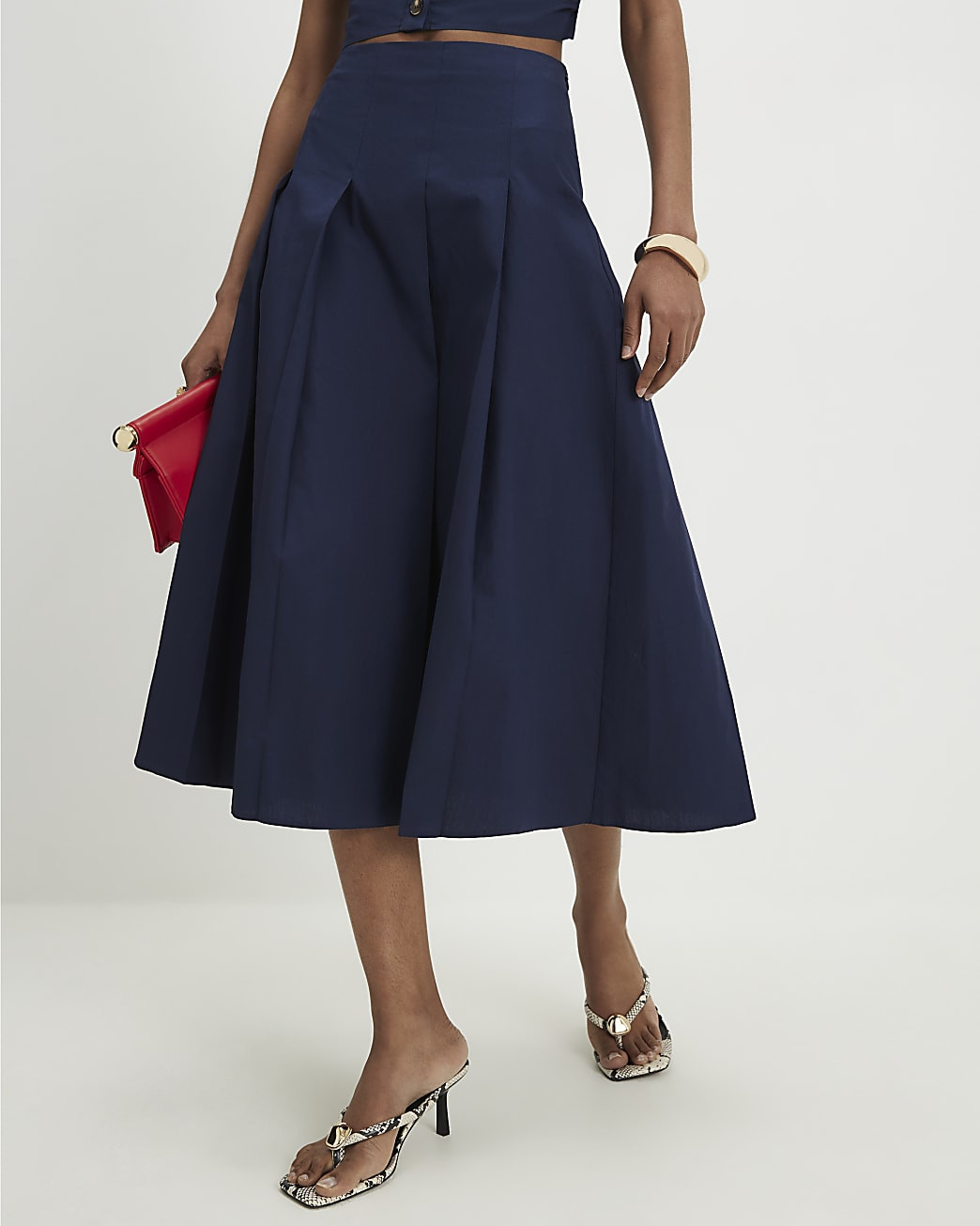 Navy Cotton Poplin Pleated Midi Skirt | River Island UK & IE