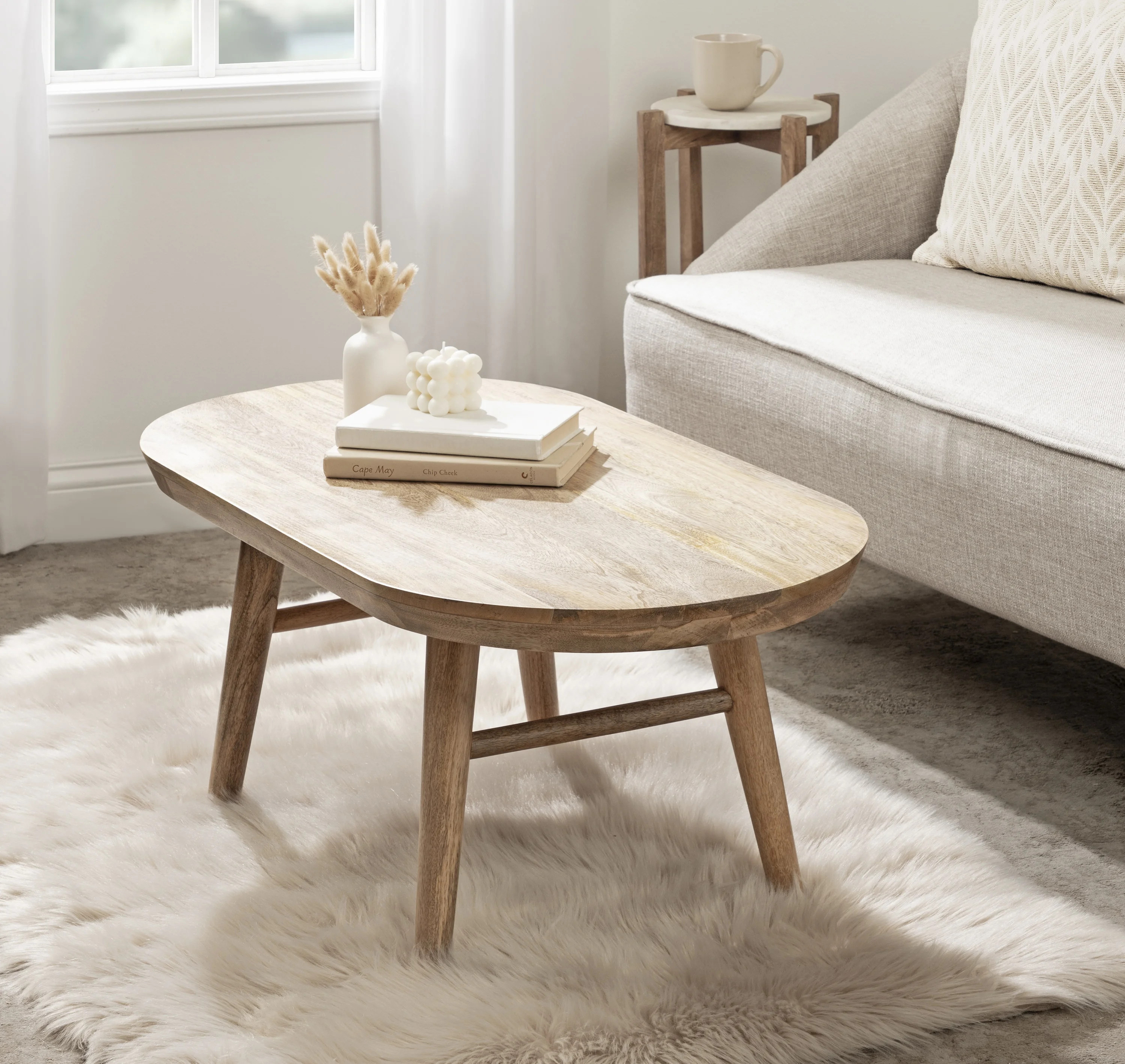 Berenike Oval Living Room Coffee Table with Tapered Legs | Wayfair North America