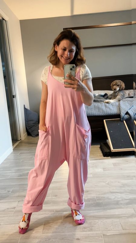 This is an oversized jumpsuit from Free People. I'm wearing XS. I added the Amazon versions as well for more affordable options. My socks are from Target and the print is a lama eating pizza. 

I'm 4'10" and 115#; bust 32B, waist 26, hips 36


#LTKover40 #LTKxTarget #LTKstyletip