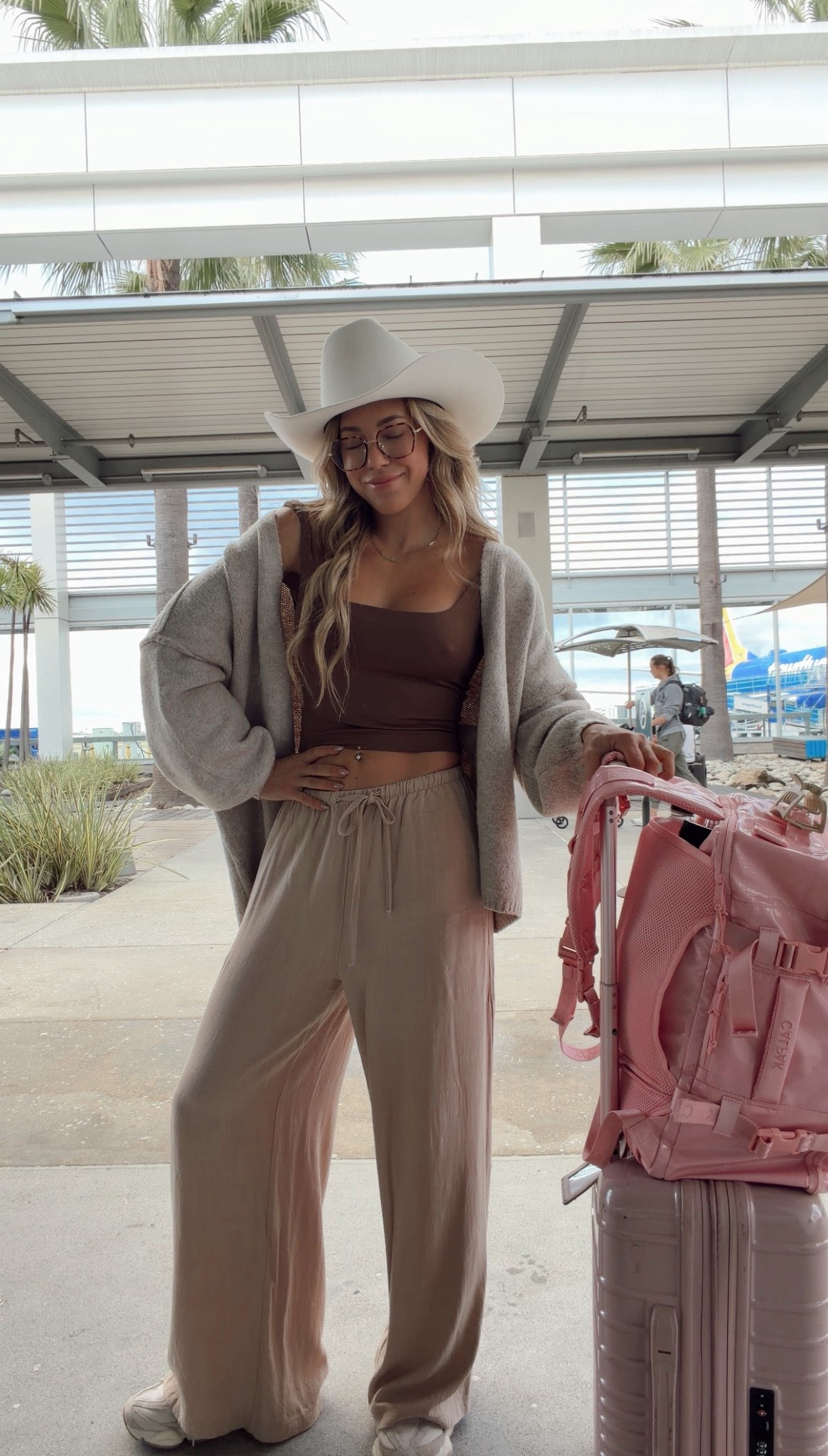 Nashville bound! airport OOTD🤠✈️ I’m wearing a medium in the sweater and drawstring pants (I like them loose when I travel) - such good Amazon finds! Also.. BEST BACKPACK ON EARTH!!!! Worth every penny 

#LTKgrwm #LTKootd #LTKTravel