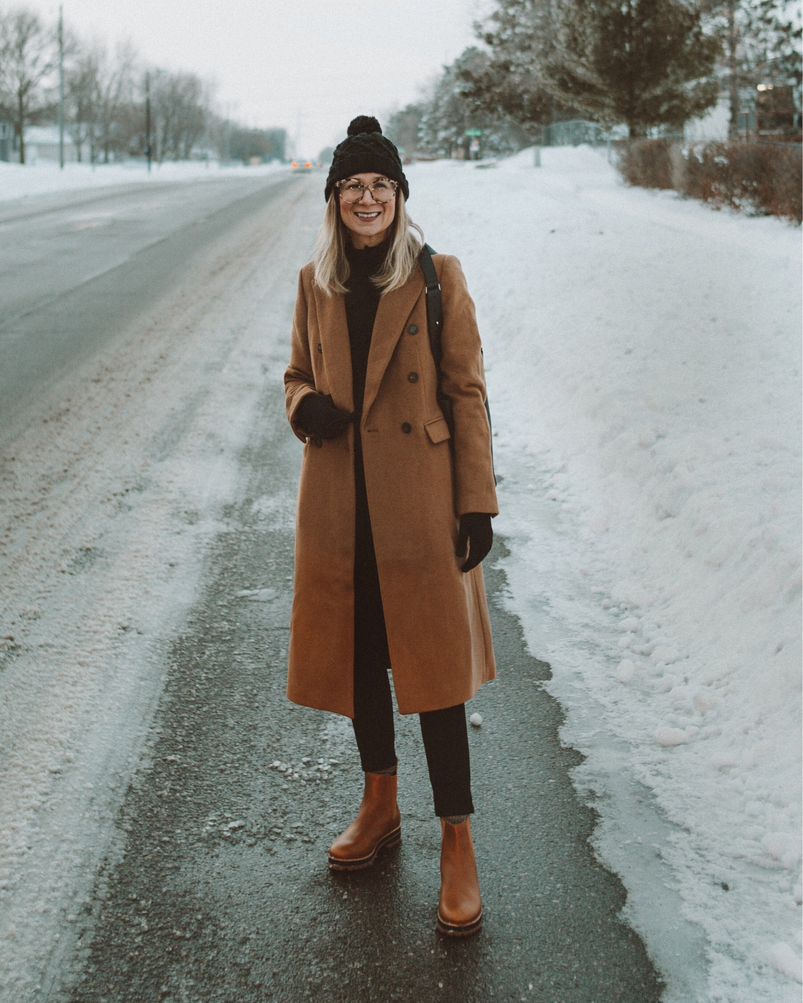 Camel colored coat, brown lug boots, black skinny jeans 

#LTKSeasonal
