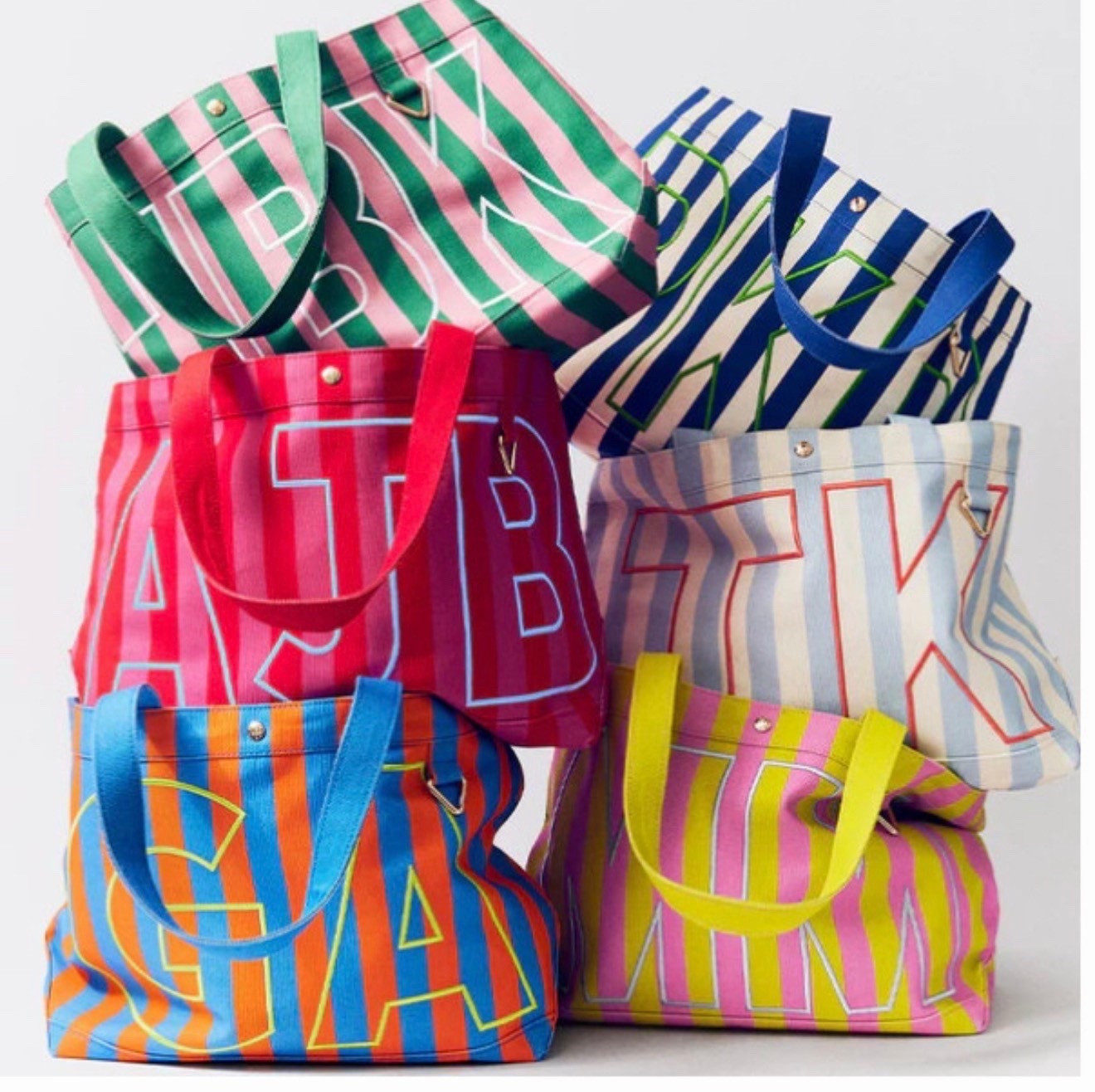 I ordered the small red and pink for my Bible… and the large orange and blue for weekend bags in Auburn  