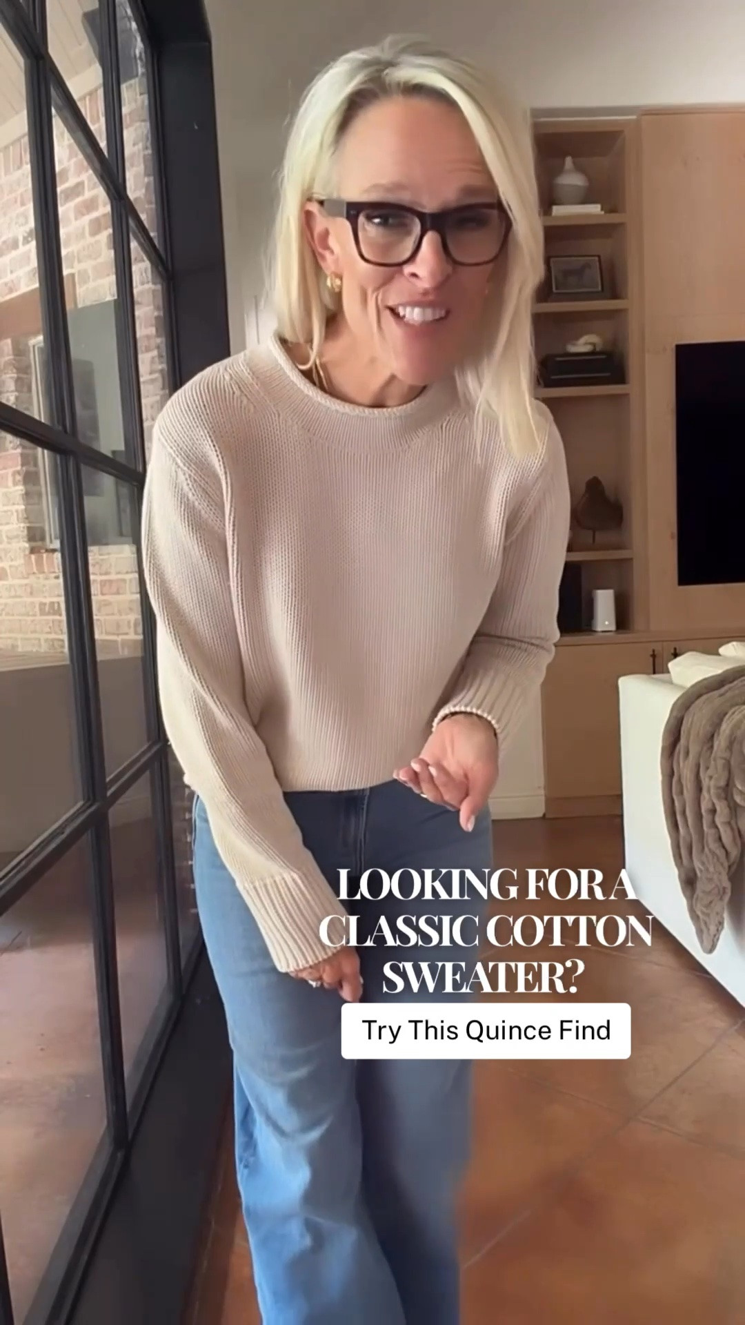 A classic cotton sweater is always worth having in your wardrobe! This Quince organic cotton roll-neck sweater is $50, and I love the beautiful neckline detail and soft neutral color. It pairs so easily with blue jeans for a polished, everyday look.

I’m wearing a medium for a little extra room, but I may exchange it for a large because I prefer a more oversized fit. It’s a timeless staple you can wear with denim, trousers, or layered over a shirt for a slightly dressier look.