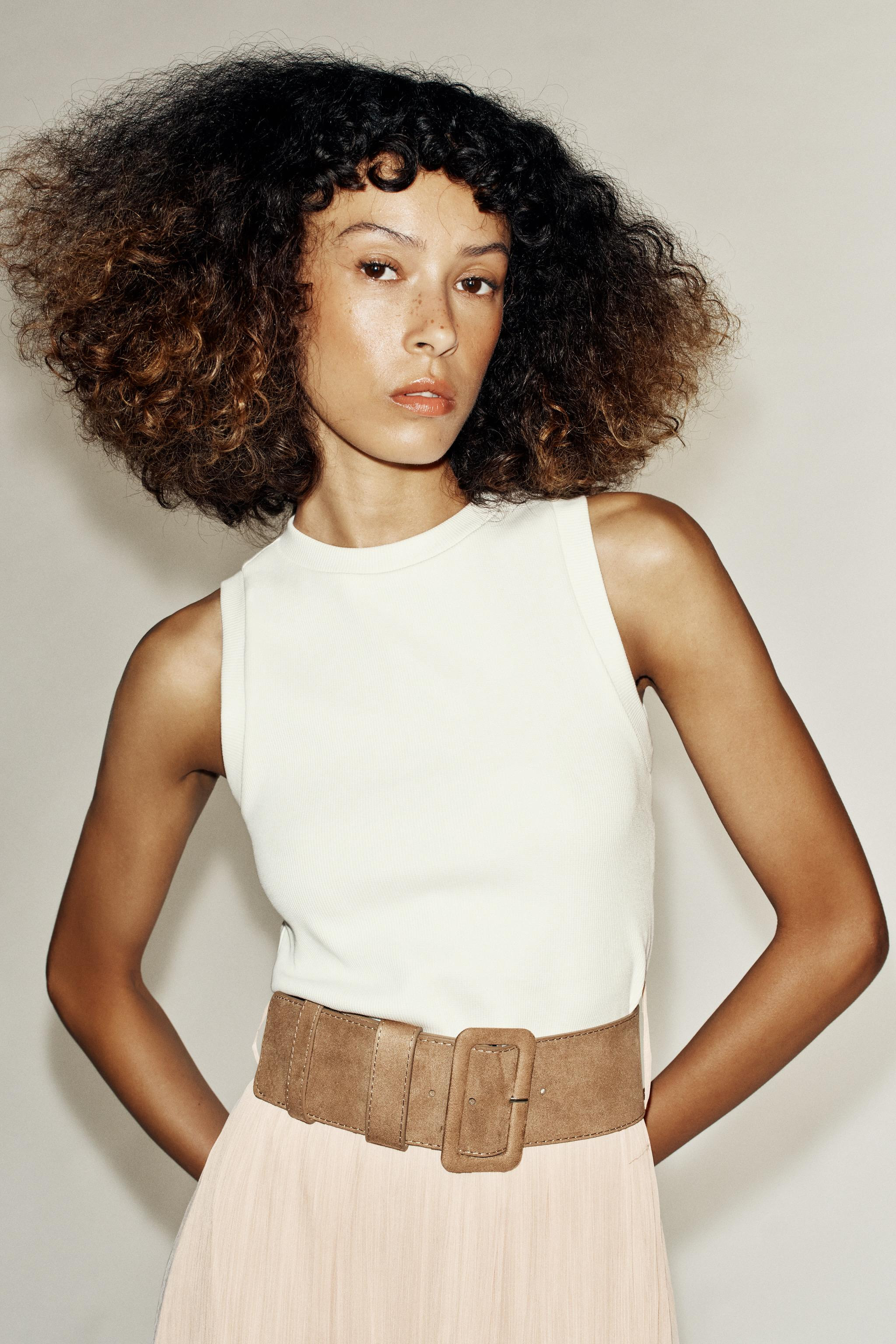 Sleeveless crew neck dress featuring a wide belt detail. Mixed fabric design with a ruffled hem. ... | Zara US