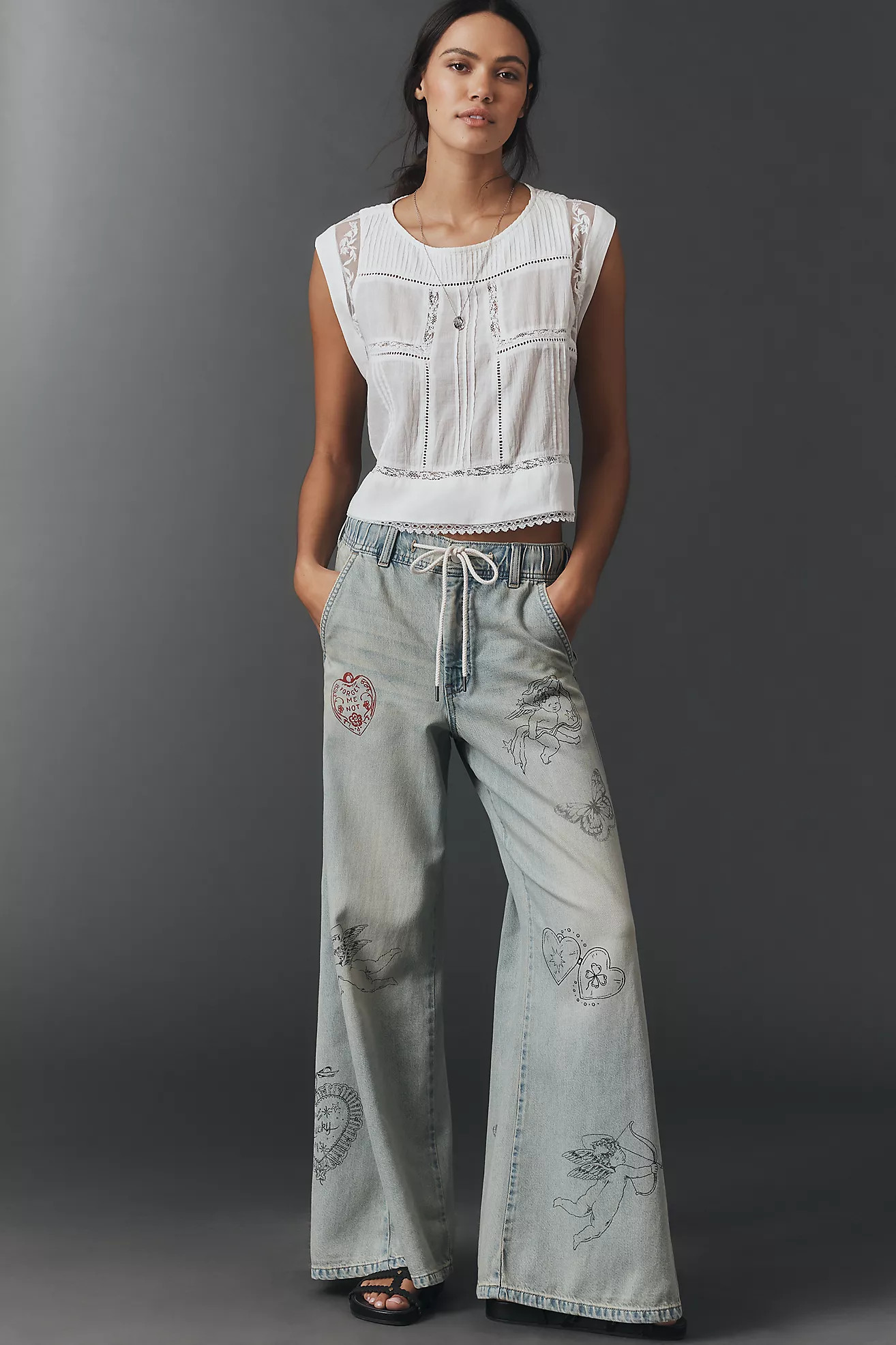 The Adi Mid-Rise Flare Embellished Jeans by Pilcro | Anthropologie (US)