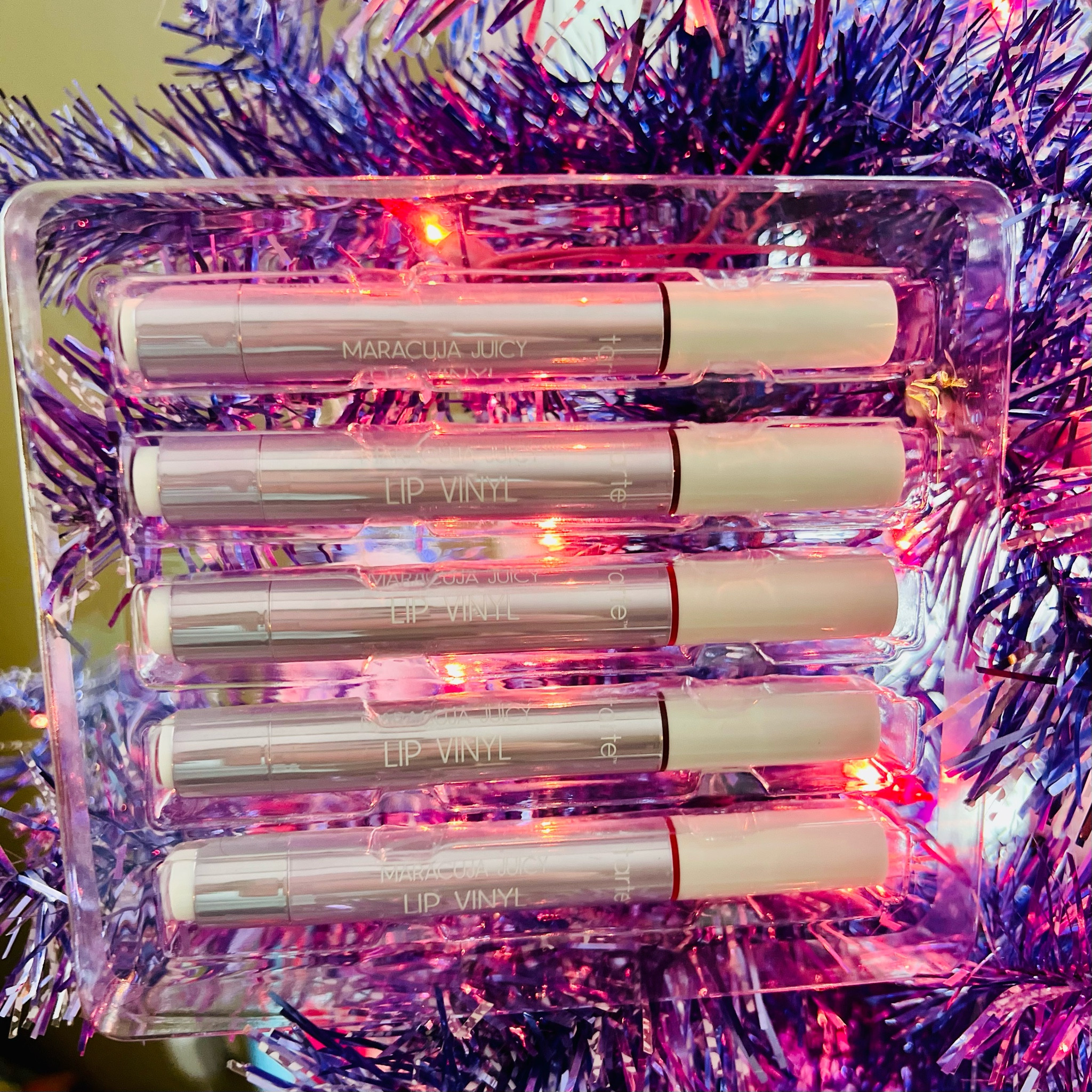 🌲 Finally gave in and grabbed the Tarte Maracuja Juicy Lip Vinyl set—so good and definitely worth it! They’re glossy, hydrating, and perfect for the holidays. Also, how great do they look with my purple tinsel tree?  

Such a good gift idea (or just treat yourself)!  

🌟 Reg. $130 → Now $51.98  
  

As low as $31 for with code HOLIDAY for new customers! That’s just $5 per lip vinyl. 👏🏻👏🏻


#loveqvc 

#LTKCyberWeek #LTKHoliday #LTKGiftGuide