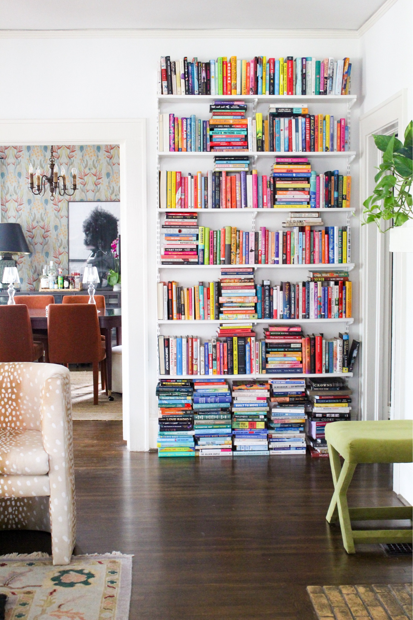 This photo feels very 2012 @pinterest coded but I love it 😂 The living room continues to be a #workinprogress however, I still absolutely love having these closet shelves turn bookshelf for my ever growing #homelibrary 📚📚

This shelving solution is currently 20% off and I have the 8 inch depth shelves in white at 48 inches wide. It is incredibly easy to hang and I just hired a @taskrabbit to anchor in the studs. my ceilings are only 9 feet tall so with the solution being 84 inches tall when hung correctly it does make it seem like this is a true floor to ceiling book solution.

Both seating options in this room are also on sale, the chair and the bench, in a variety of color ways. 

This is easily one of my favorite views in this room because I am able to see the dining room which is such a contrast from the very bright living room with all of the Moody, muted, jewel tones in the wallpaper and curtains and chairs and art – I just love it so much! 

Shop this space! 

#LTKSaleAlert #LTKHome #LTKBacktoSchool