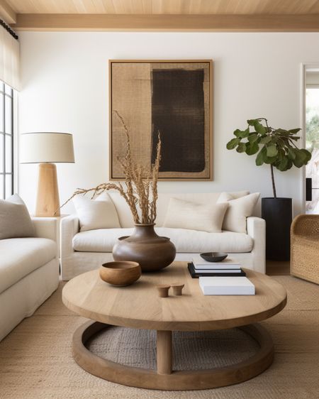 cool but cozy - round wood coffee table, white linen sofas, abstract art, large planter, and natural vases 

#LTKfamily #LTKhome #LTKstyletip