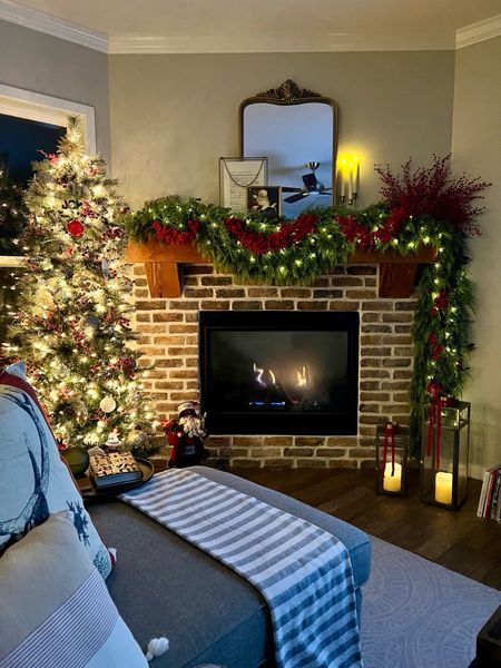 The coziest Christmas fireplace mantel setting!

#LTKhome #LTKHoliday #LTKSeasonal