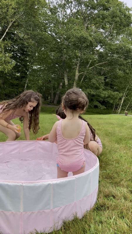 July was a good one. ☀️💦 (Little girls playing in their pink bathing suits in a mini pink pool with reusable Star water balloons from Amazon.) 

#LTKSeasonal #LTKfamily #LTKkids