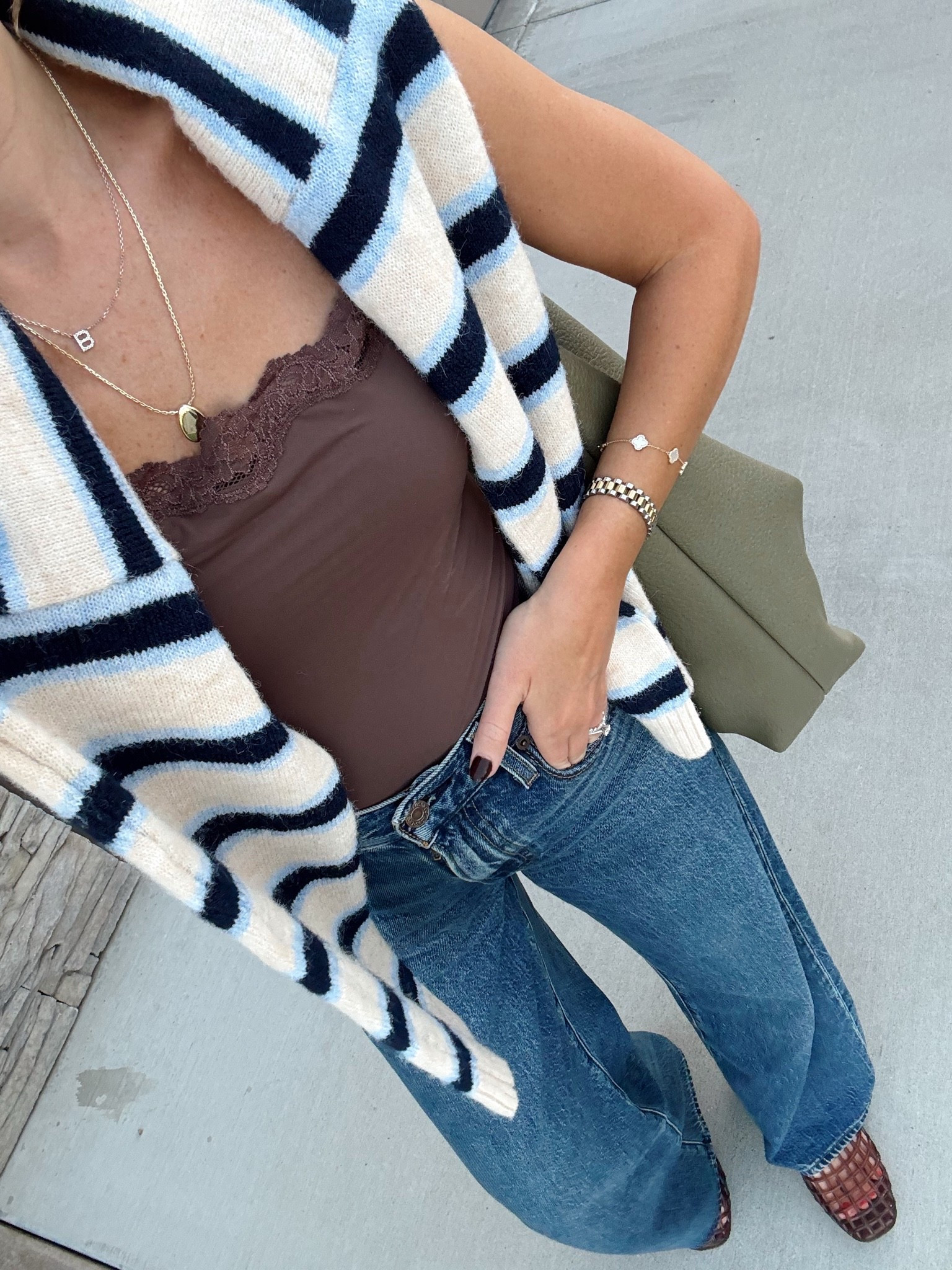 OOTD and it’s all on sale! This tank has built in padding and is sooo soft! These jeans have a cinch waist and are so flattering! Wearing size 25 denim, small tank and medium pullover