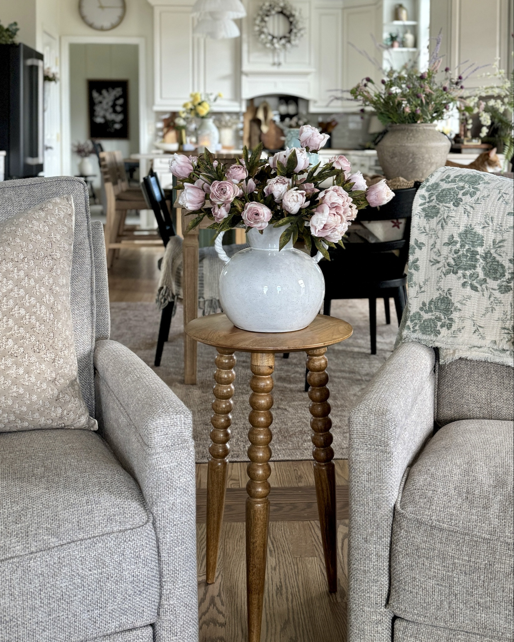 Wayfair sale! Lessing solid wood accent table on sale now 48% off! 

White ceramic vase with braided handles

Peonies

Accent swivel glider chairs 

Pretty spring throws