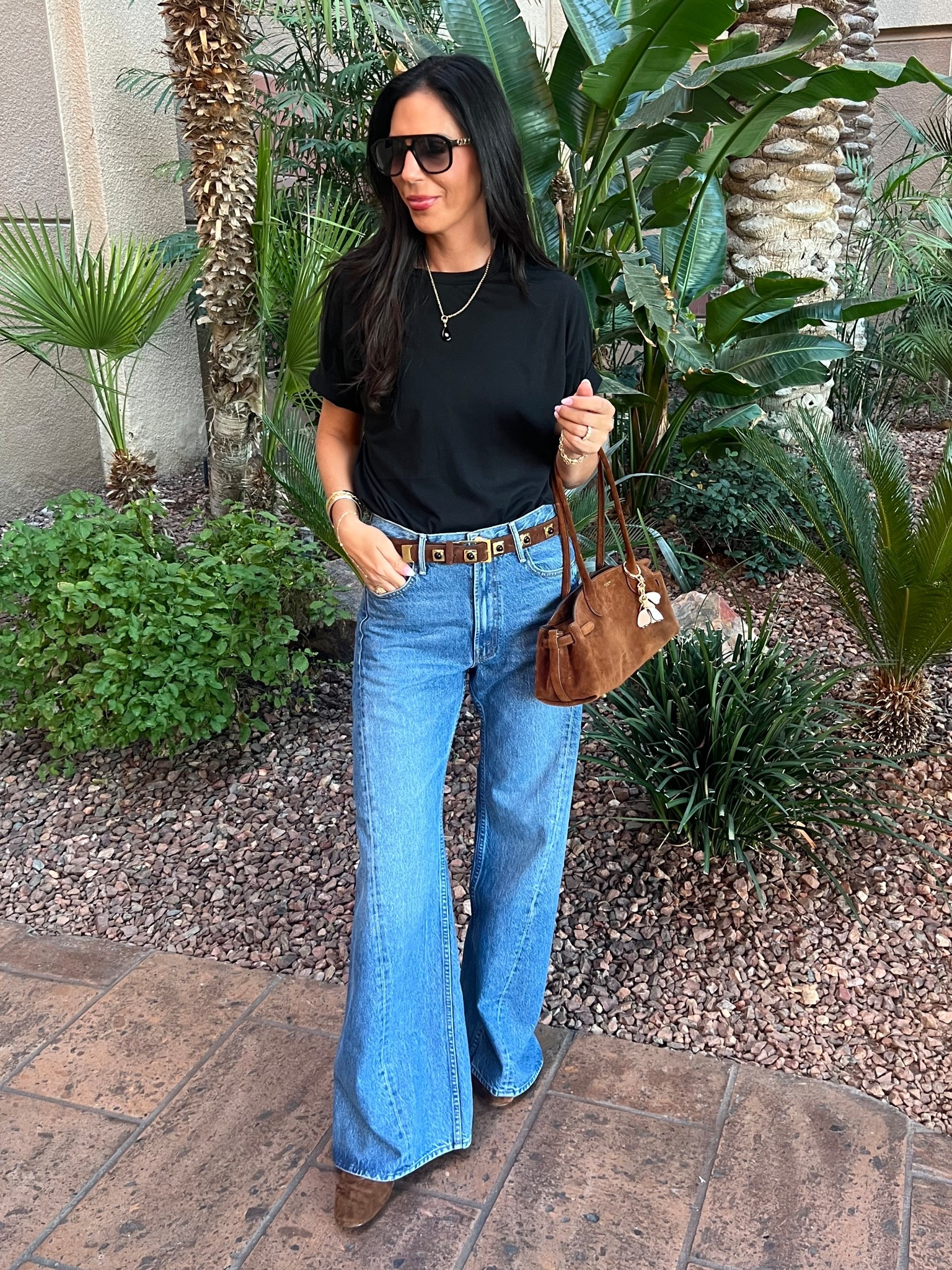 Dinner casual with a back tee and jeans that are so flattering!  Mix and match brown suede and black 
Tee- small 
Jeans- size 27 
