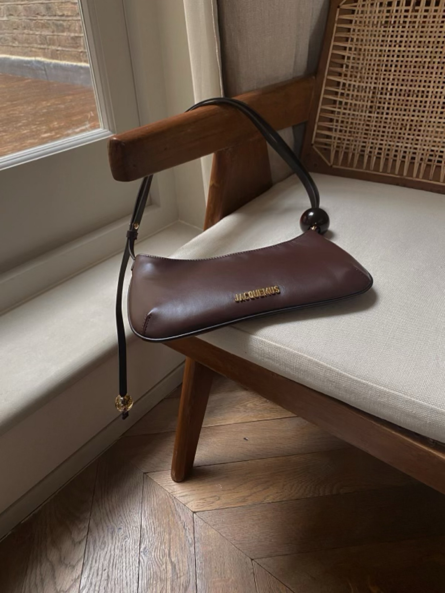 JACQUEMUS Le Bisou shoulder bag, chocolate brown bag, 90s shoulder bag, designer bag, brown leather bag. 

#LTKSeasonal #LTKworkwear