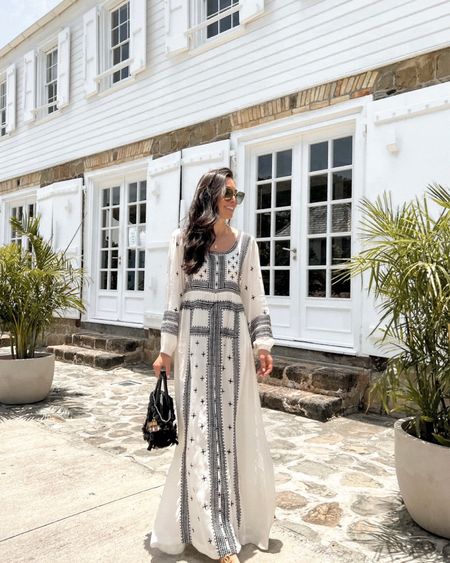 Kat Jamieson wears a Stella Forest dress and carries a Figue black handbag as the perfect summer vacation outfit. What to wear on vacation, vacation style, resortwear, neutral dress, black handbag, summer style.

#LTKSeasonal #LTKstyletip #LTKtravel