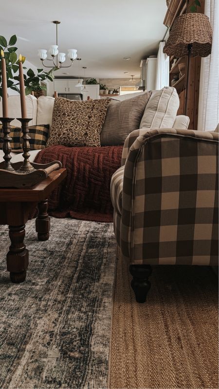 Plaid chair, turned legs, vintage Kilim rug pillow cover, milk glass chandelier, rug, seagrass lampshade 