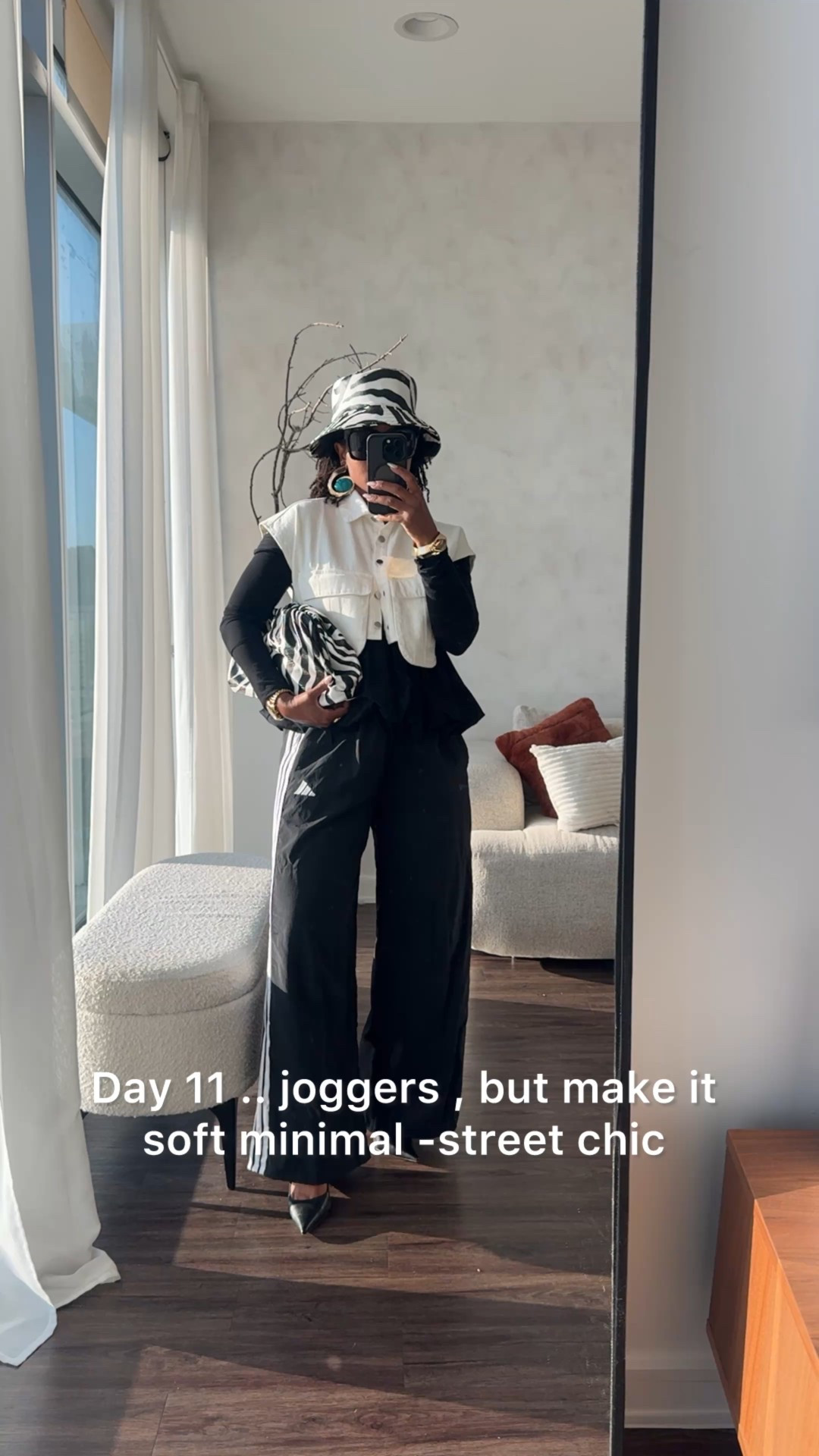 Day 11 and I challenged myself to style my @adidas joggers pants! Paired this with my @thelinebyk top  and Amazon crop jacket ! Deced to keep the black and white theme going with a pop of teal (my absolute favorite color) . Concert, happy hour , or homecoming coming up? Feel free to steal this look. 

These pants are a medium (5’2 size 8) 
Unlinkable mentions: 
Hat : @opulencebyjc

