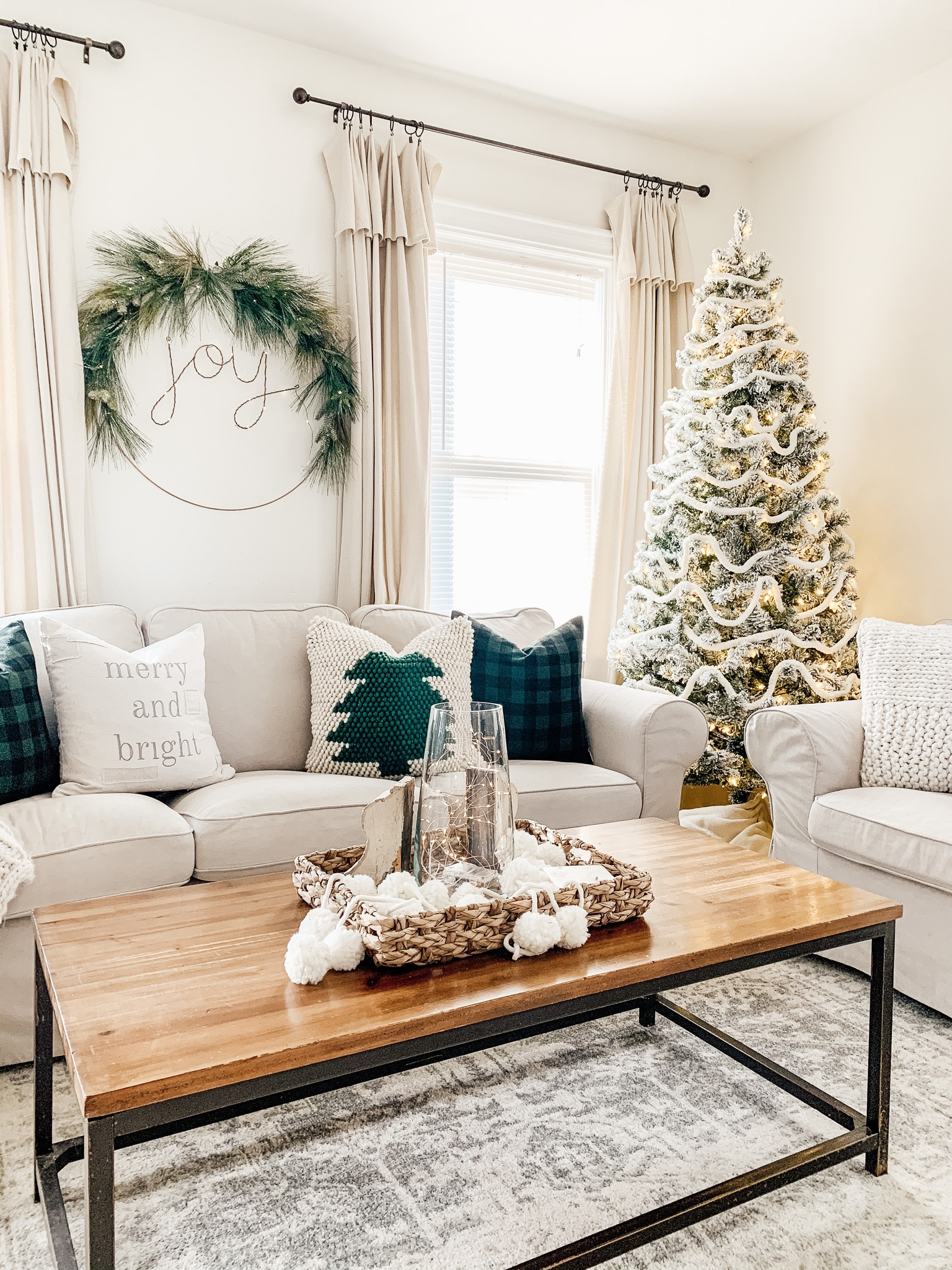 Neutral Christmas living room. Flocked Christmas tree. Lit wreath, tree pillow, holiday pillows

#LTKSeasonal #LTKhome #LTKHoliday
