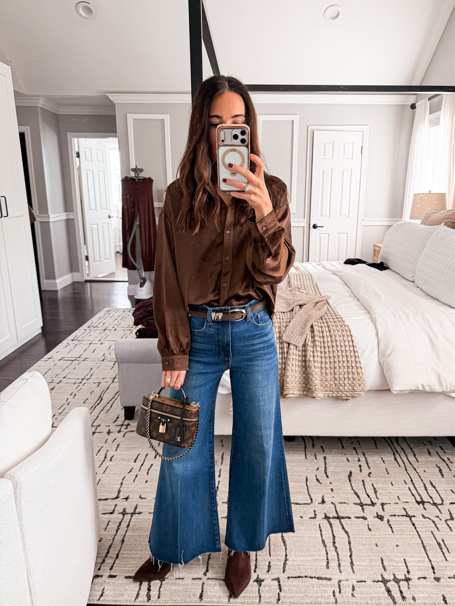 This satin button-up looks so luxe and feels so smooth on your skin 🤎 Paired it with wide jeans. Wearing xs top and 25 in jeans 

#LTKGiftGuide #LTKHoliday #LTKCyberWeek