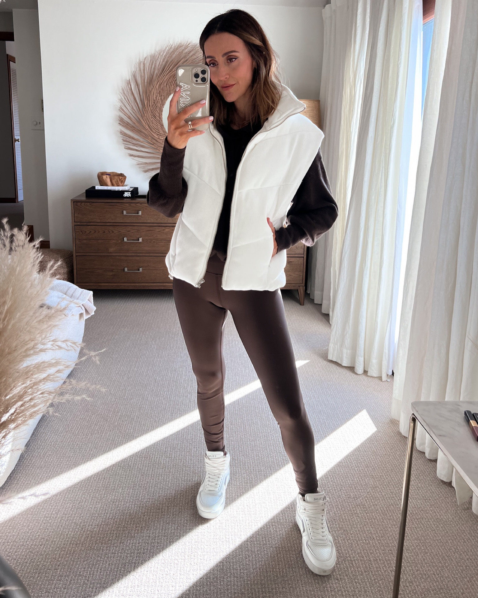 Karina wears Alo Yoga white ribbed oversized puffer vest - Karina Style  Diaries