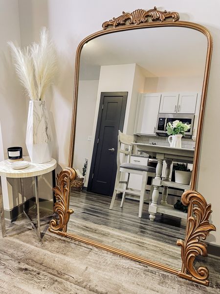 Anthropology dupe mirror that I love! 

#LTKFind #LTKU #LTKSeasonal #anthropologymirrordupe #goldmirror #valentinesday #vacationoutfit #mirrors #homefinds #bedroommirror #tallmirror #goldmirror #largemirror #primrosemirror #kirklands 

#LTKstyletip #LTKfamily #LTKhome