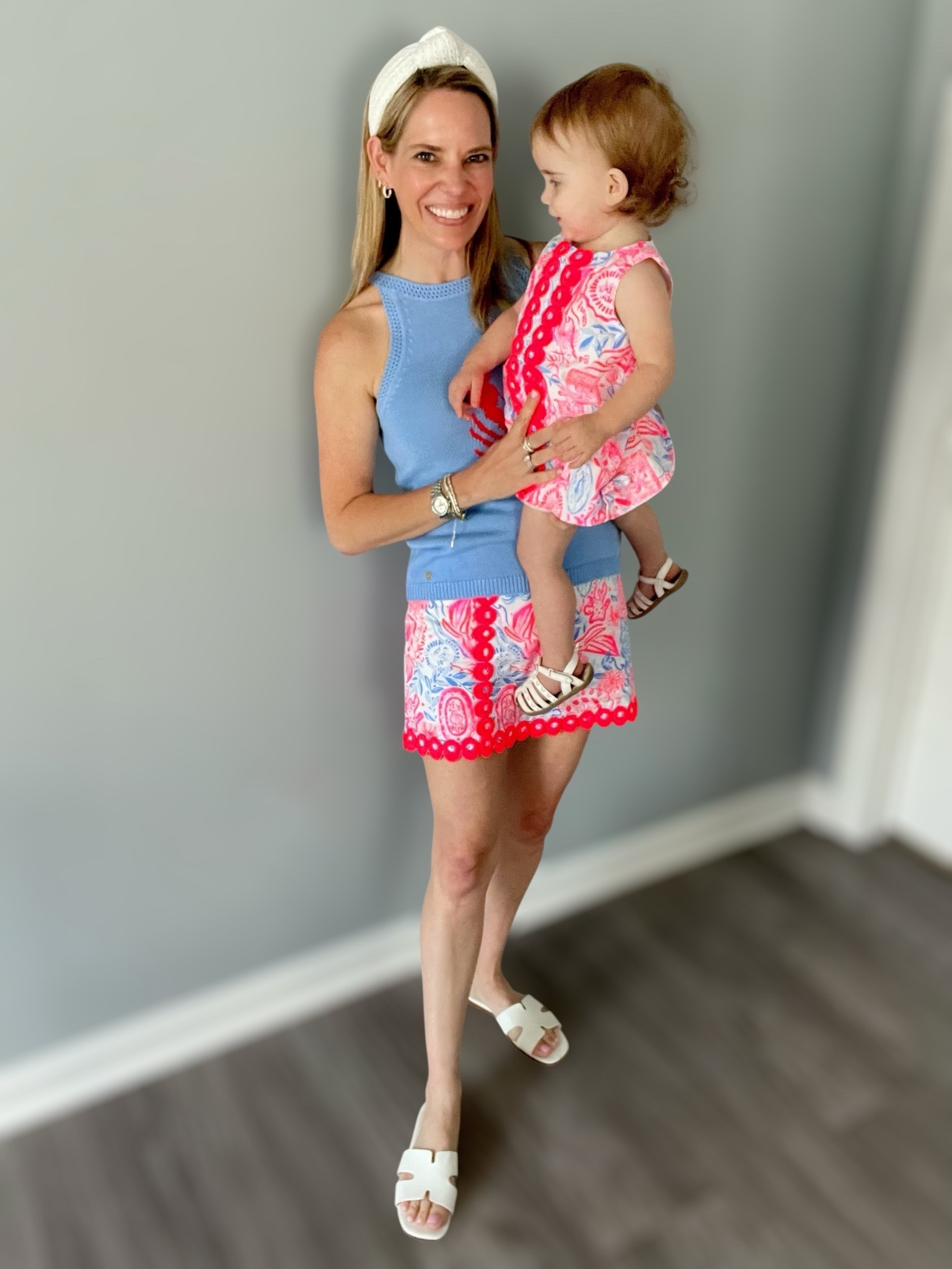 🎀 Mommy & Me in Lilly Pulitzer Pink Perfection
Nothing says summer quite like a bold Lilly print 💗 This mommy-and-me matching moment is full of color, charm, and coastal chic vibes from head to toe 🌊☀️

👩‍👧 Mom’s Look:
	•	Wearing the Lilly Pulitzer Scallop Skort in size 0 — features an eye-catching pink + blue border print and that signature scalloped hem 💕
	•	Paired with a soft blue knit sleeveless sweater in size XS, perfect for layering or styling solo 🔹
	•	White textured headband + white slide sandals complete the look 🤍
	•	✨ Jewelry by Melinda Maria — use code PREPPYREBEL for 10% off your order! 💛

👧 Baby Girl’s Look:
	•	Matching infant Lilly shift dress (size 12–18M) in the coordinating print 🎨
	•	Classic shift style with pink ric-rac trim, button shoulders, and all the summer sweetness 🍭
	•	Styled with white sandals for a breezy finish 👣

Perfect for brunch, beach trips, or just twinning in your favorite print!

⸻

#LTKMomStyle #MommyAndMeLooks #LillyPulitzer #PreppyStyle #ScallopSkort #InfantShiftDress #MatchingMoments #SummerOutfitInspo #CoastalStyle #MelindaMariaJewelry #PREPPYREBEL

#LTKBaby #LTKFindsUnder50 #LTKKids
