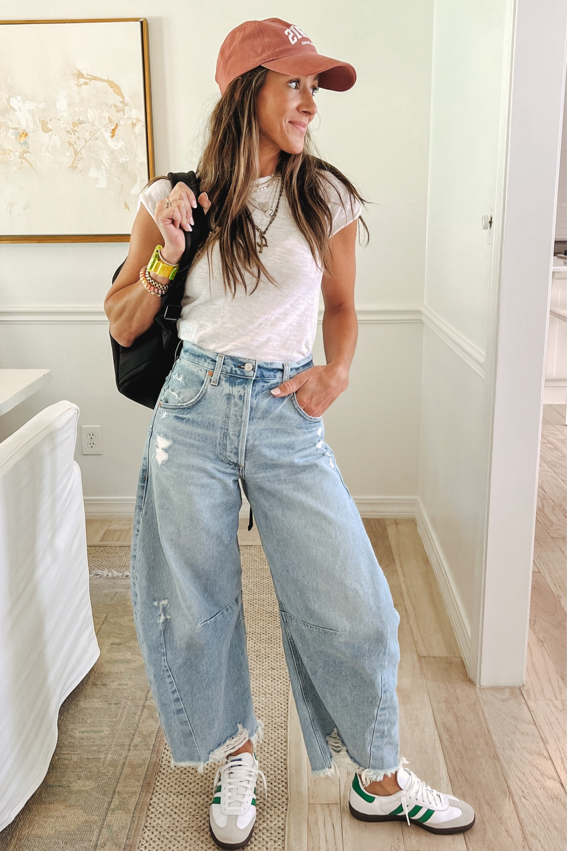 Weekend outfit idea. Again with my citizens horseshoe jean or the barrel. Jean. I can’t stop wearing them! Paired with my adidas sambas in green stripe. Free people white baby tee and anine bing hat! Love my dange Dover backpack bag. I use it for travel but with all of the kids games and tournaments lately I’ve been using it so I have free hands but still can pack errrything  

#LTKfindsunder100 #LTKstyletip