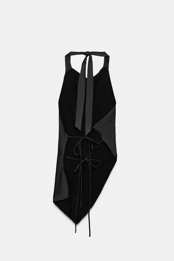 Draped halter neck top. Open back. Asymmetric hem. Tie fastening at the back and neck. | Zara UK