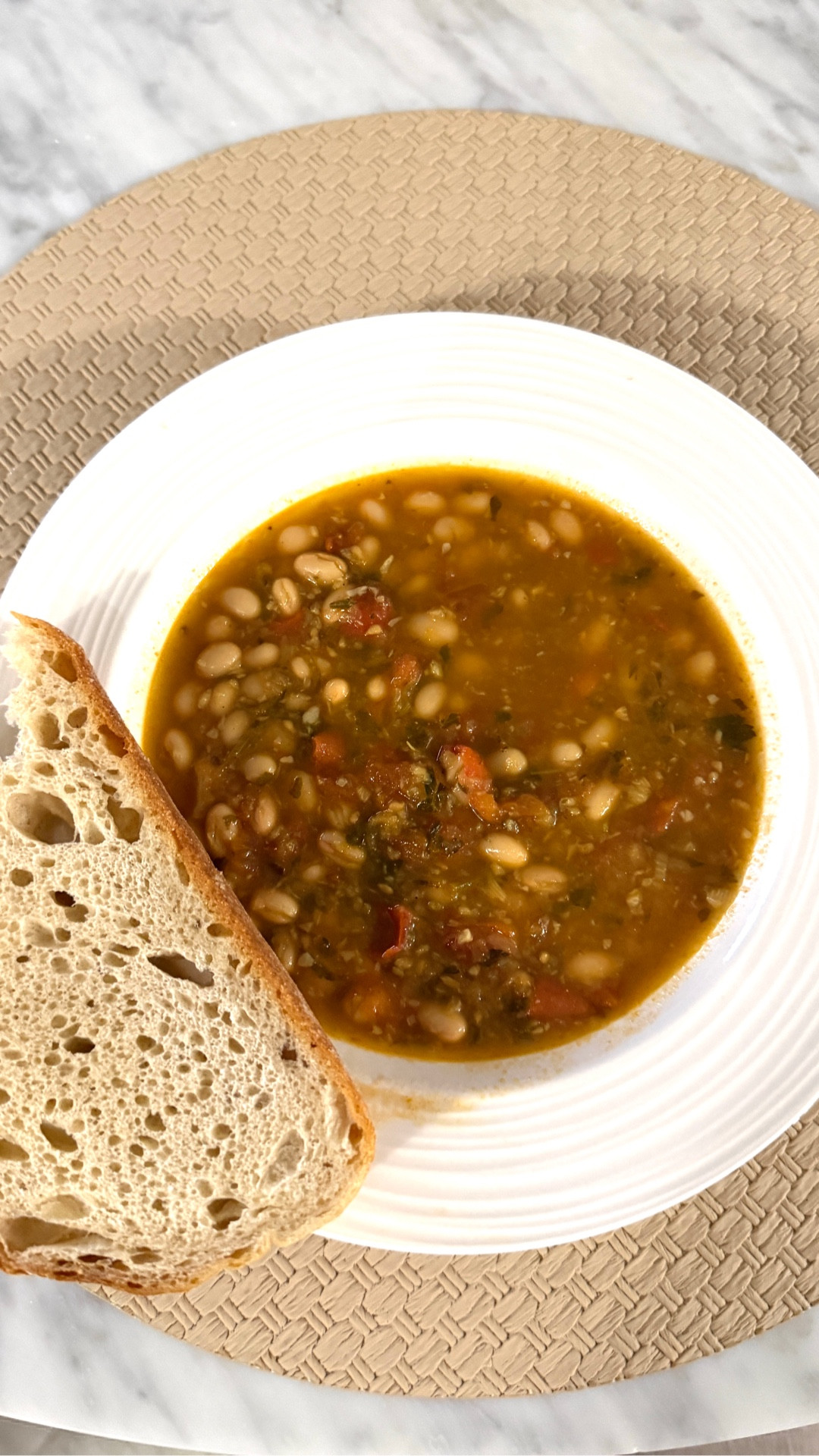 Simple and nourishing white bean soup with a piece of sourdough bread. Inspired by the blue zones. This fall try this soup. Gut healthy, warm and delicious. 

#LTKActive #LTKSeasonal #LTKFindsUnder50