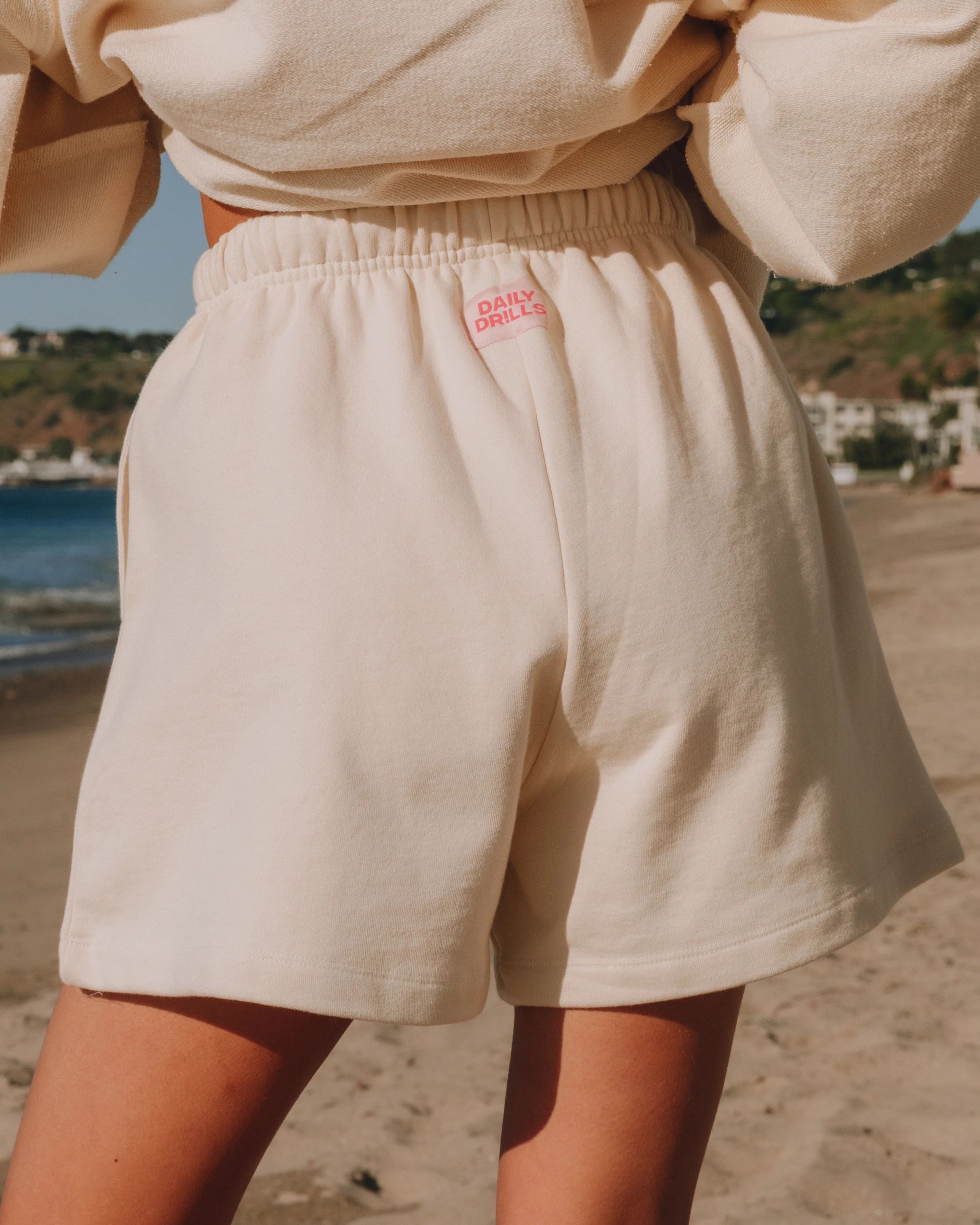 Sweat Shorts with Pink Patch | Daily Drills