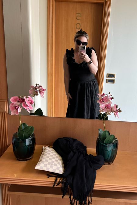 This black free people dress was amazing and I wore it multiple times on our trip 

I’m wearing a large 

In Italy in general but in Milan especially you’ll want to have a wrap handy to cover your shoulders 
 This dress also has pockets which makes it a great vacation outfit 


#LTKtravel #LTKFind #LTKstyletip