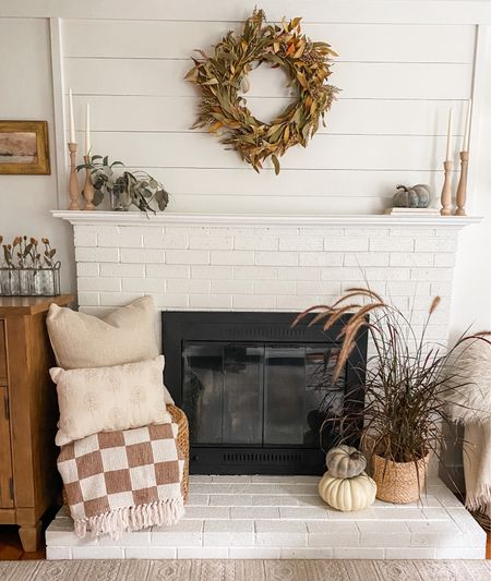 Cozy neutral fall decor. A simple and easy way to decorate your fireplace for the fall season! 

Fall, fall decor, fireplace decor

#LTKstyletip #LTKhome #LTKSeasonal