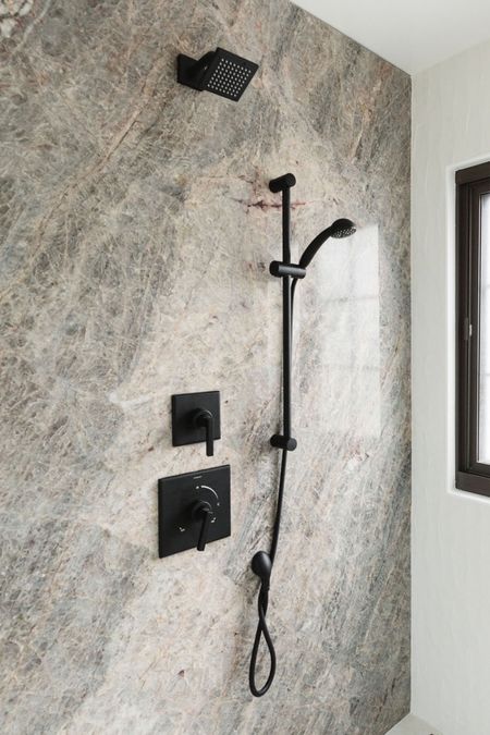Wow factor bathroom. We used a large slab in the shower and shower system in a contrasting black. Create a relaxing shower ritual by adding exfoliating salts, soothing oils, and mood setting candles.

Shower head, bathroom finds, faucet, home finds, bathroom decor, bath, shower drain, towels, bathroom shower, shower faucet. 

#LTKstyletip #LTKhome