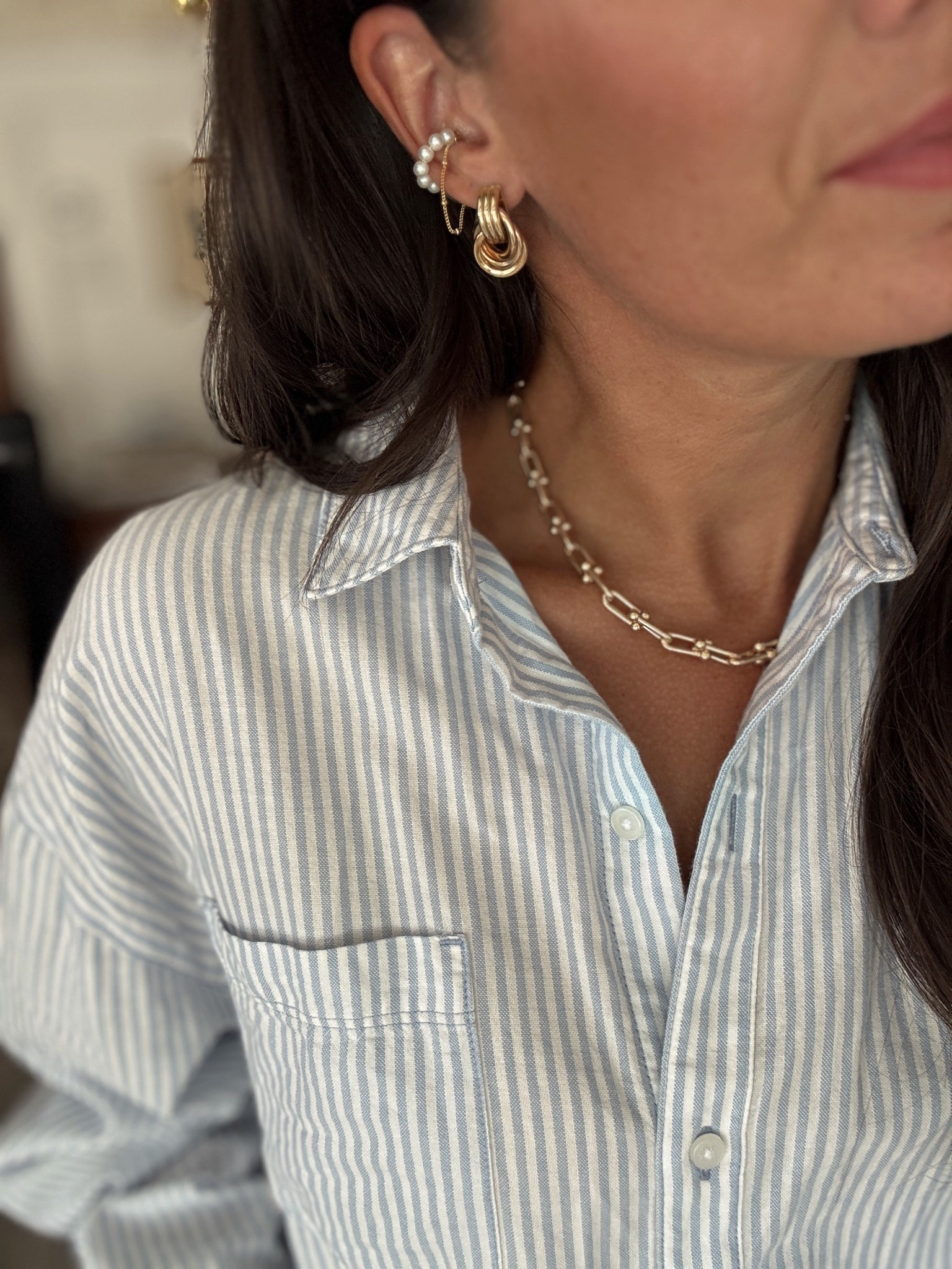 Gold knot earrings + pearl ear cuff + layering chain necklace = my everyday jewelry stack. Simple, timeless, and easy to mix with any outfit. 

#LTKWorkwear #LTKStyleTip