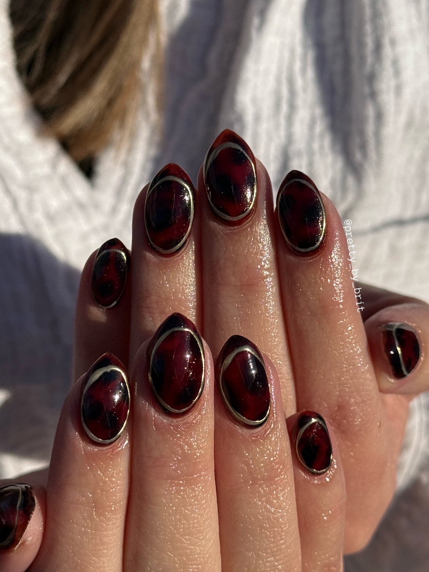 Boujee queen almost blew away 

Products & codes for tortoiseshell art ⬇️

@luminary_nail_systems clarity base

@bornprettyofficial 
-Sunset Jewel 06 (linked in Amazon storefront)

@southtxnailsupply 
-Blooming gel

@madam_glam discount code BRIT35
-Perfect Black

@chaunlegendnails discount code PRETTYBYBRIT
-Non wipe top coat
