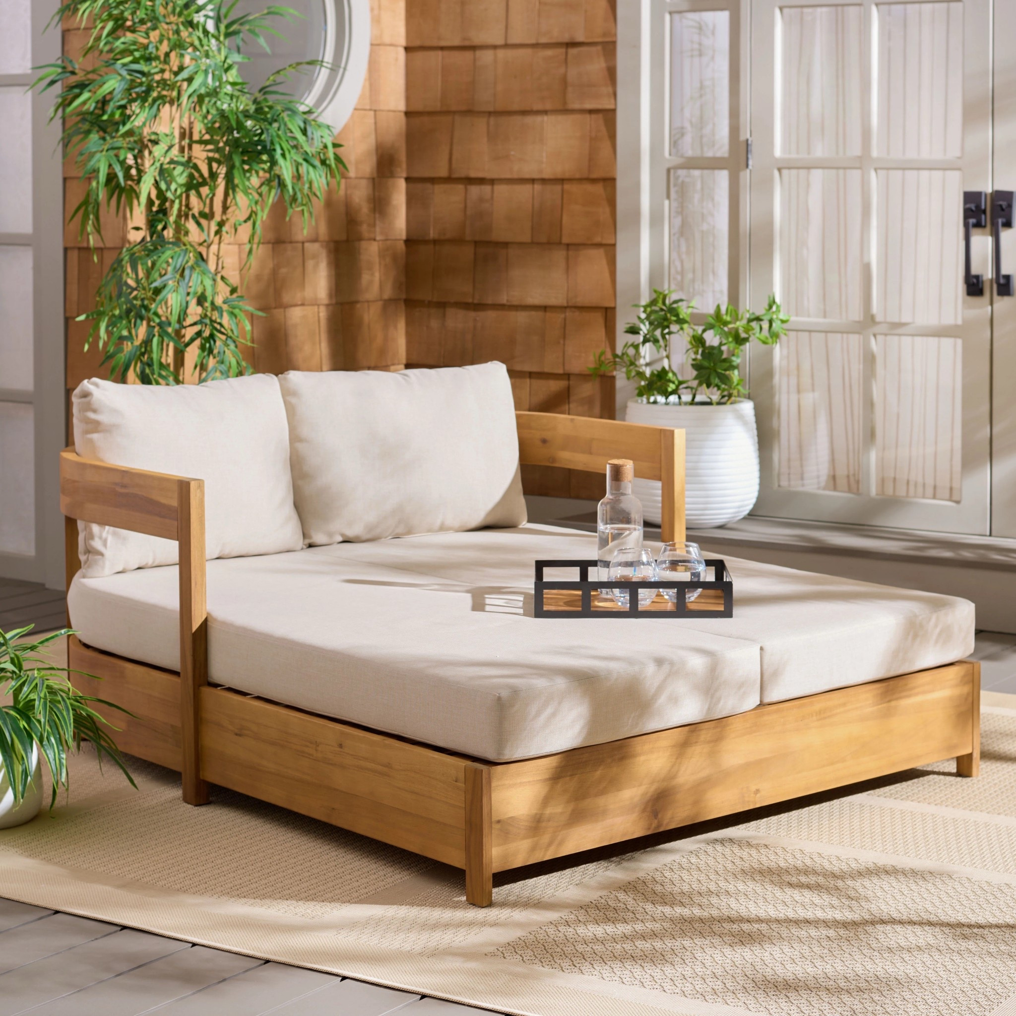 Tropical vibes meet luxury lounging — the Kento wooden patio daybed is perfect for curated outdoor spaces and sun-soaked afternoons. Style it with plush cushions for a boutique resort feel. This daybed is under $1,000.

Keywords: Patio daybed, daybed, outdoor daybed, patio decor, patio chair, patio furniture, luxury patio furniture 

#LTKSaleAlert #LTKSeasonal #LTKHome