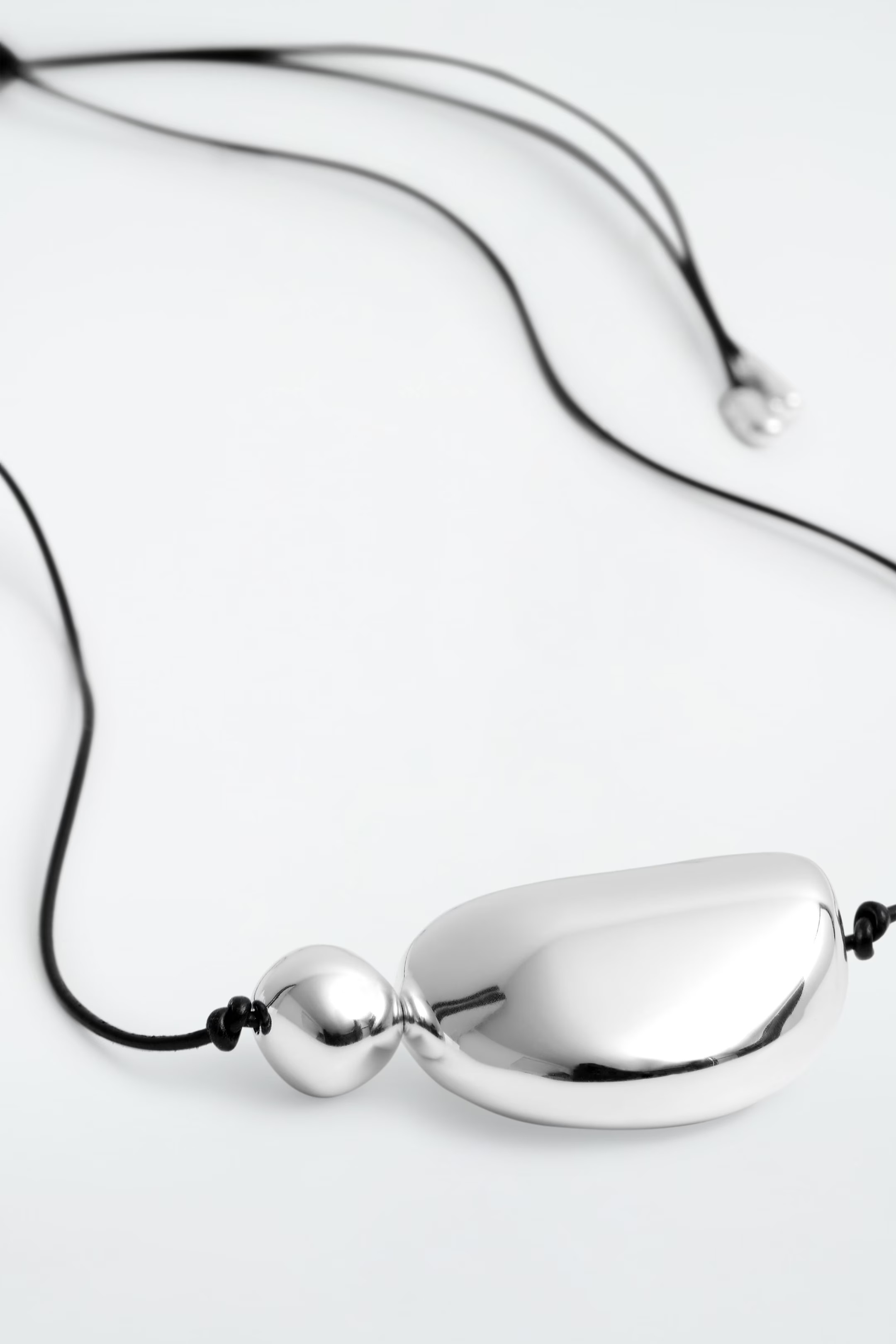 LEATHER CORD PEBBLE PENDANT NECKLACE - SILVER | COS UK