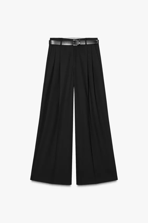 Mid-waist trousers with belt loops. Double pleat detail. Side pockets and mock welt pockets on th... | Zara US