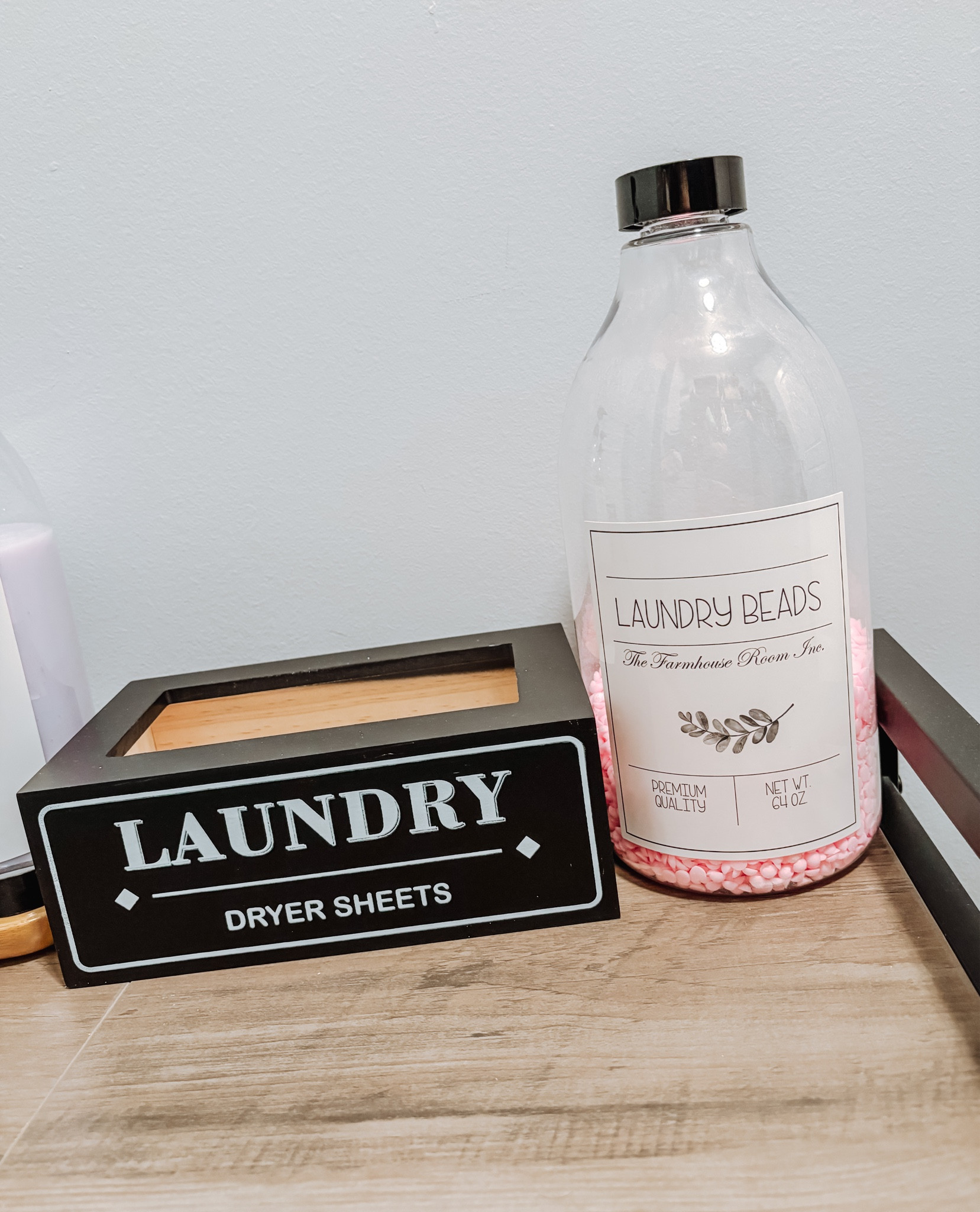 Wanna make doing laundry a little less mundane? How CUTE are these two pieces to store your dryer sheets & laundry beads?! A cheap way to elevate a room you spend a lot of time in already, so add some *HAPPY* to your space🥰 #laundry 

#LTKfindsunder50 #LTKhome #LTKfamily