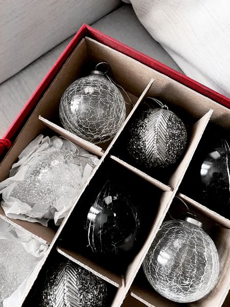 My favorite way to store ornaments is with this high quality cardboard ornament box!

Clear round ornaments are from At Home, black marble ornaments are from CB2 several years ago, and the clear tear drop ornaments are from Home Goods this year.

#LTKhome #LTKSeasonal #LTKunder100