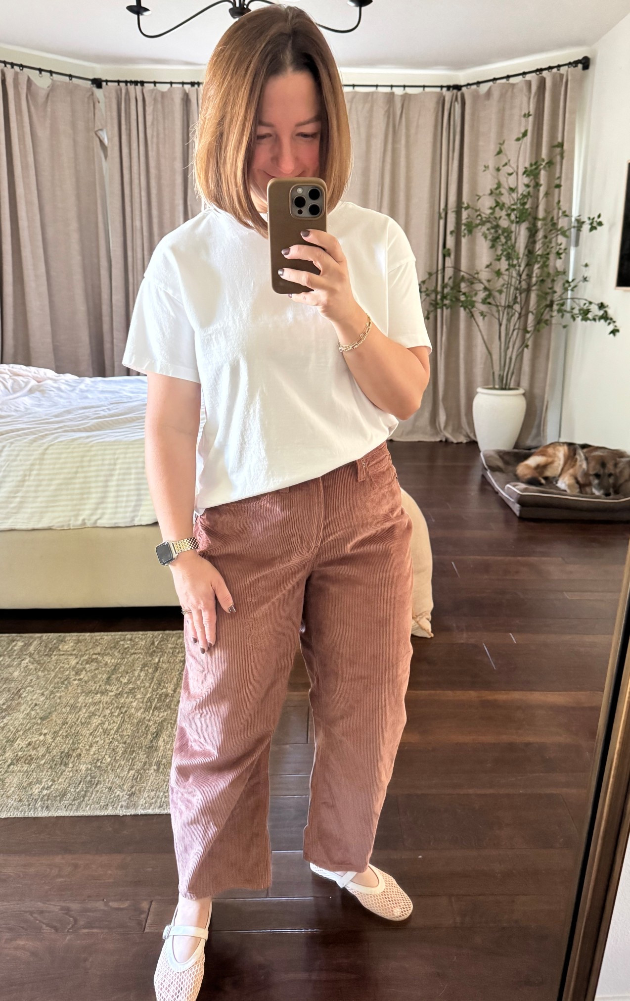 Old navy 50% off sale on these brown corduroy barrel pants and classic white tee.  Love this brown nutmeg color for fall. Casual mom outfit.