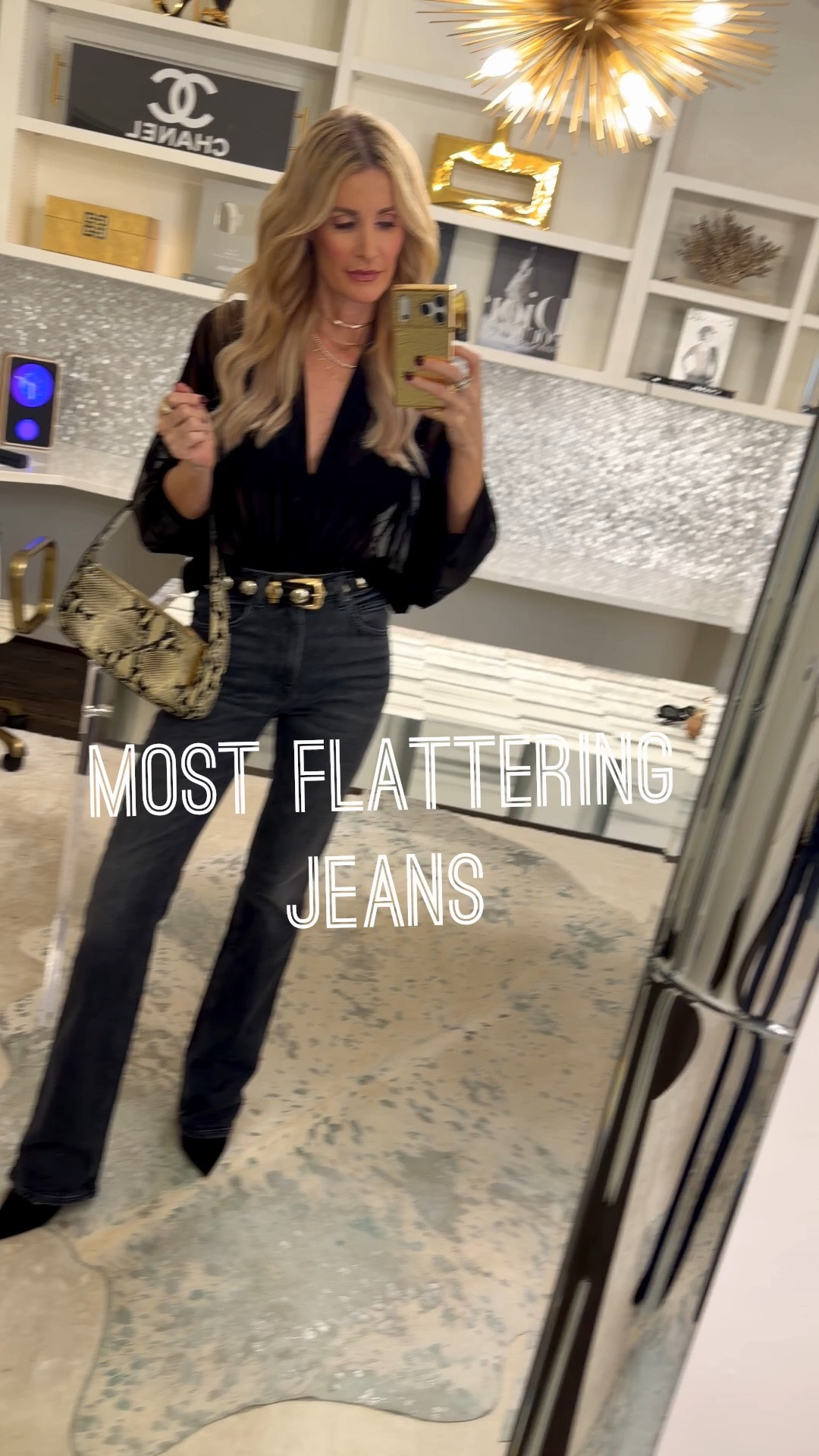 Live Music Night Out 🖤

Edgy, effortless, and made for a night of live music. Here's the formula:

	1.	Black sheer bodysuit. Sleek, a little daring, and tucks in seamlessly with no bulk. Fits true to size; I'm wearing an XS.
	2.	High-waisted slim bootcut jeans. This charcoal-gray faded black wash gives the whole look its edge, and the bootcut cut is universally flattering. It lengthens the leg for that model-esque line every time. Fits true to size; I'm in a 24.
	3.	Studded belt. This one is the finishing touch that makes the outfit. Mine is Khaite, but I found a Quince version that looks exactly the same for a fraction of the price, and that's the one I've linked for you

#LTKootd #LTKgrwm #LTKOver40