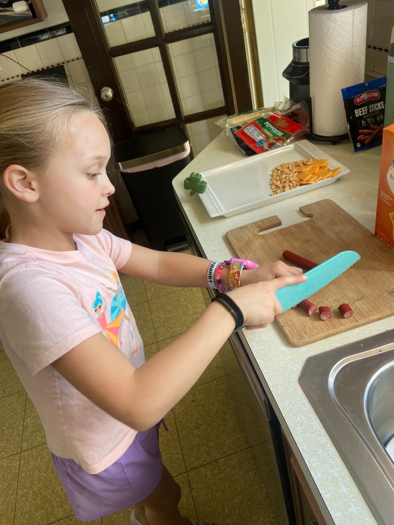 Kid charcuterie kit.  This is so kid friendly: the knives and utensils are perfect for small hands, that cut well without worry of hurting themselves; cutting board works great; and it’s a great way for them to help out with their own snacks  


#cooking #charcuterieboard #charcuterie #kidgift #kidcooking #giftidea 

#LTKKids