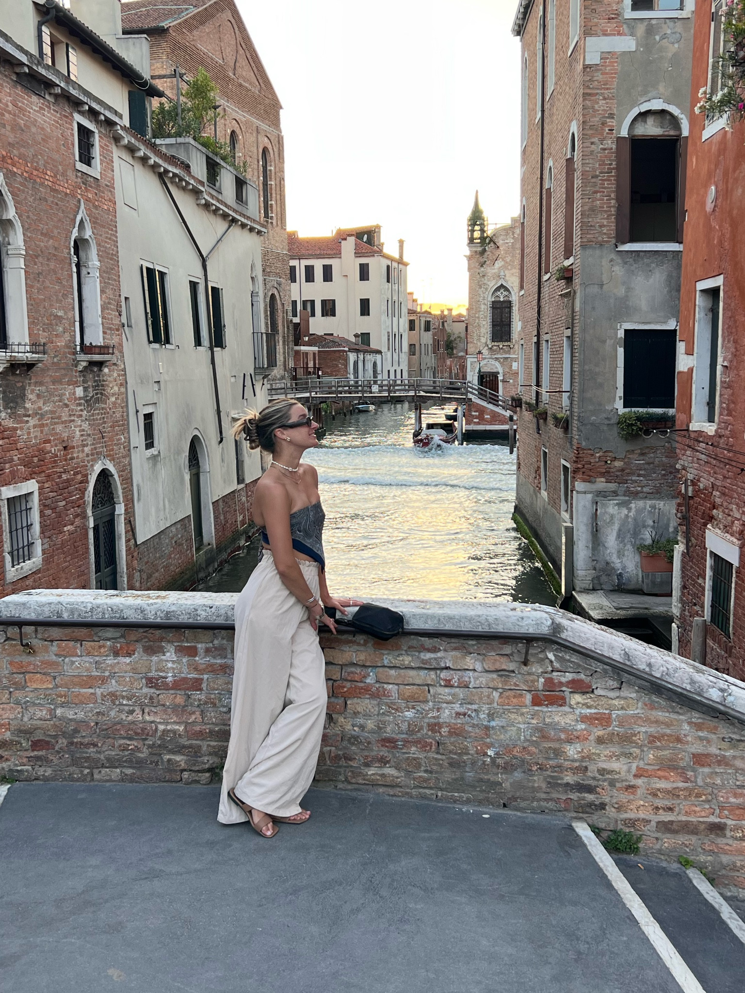 venice sight seeing 🎭
i had to recycle a lot outfits when traveling so here are some pants (s) from a set and a scarf i made into a top- scarf i got in morocco but i linked a similar one i’ve gotten and i like the quality! sandals are 7.5/8 and sunnies are from a random boutique but i bet you can find on amazon! great outfit for the summer and great for packing light since it packs very well!

#LTKeurope #LTKtravel #LTKMostLoved