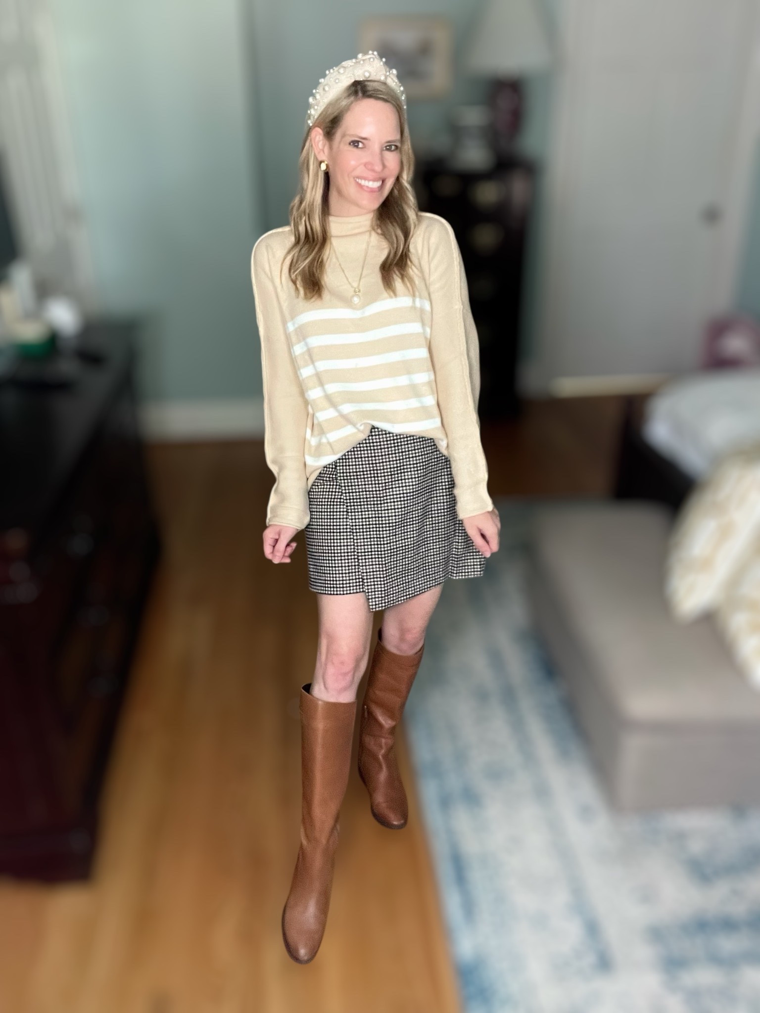 ✨ Classic fall style with a modern twist! I paired this chic ANRABESS almond + white striped sweater with the Old Navy plaid wrap-front mini skirt for the perfect mix of cozy and polished. The neutral tones make it easy to style with tall brown boots for a timeless preppy vibe. 🤎

I finished the look with pearl headband accessories and my favorite Melinda Maria jewelry (use code PREPPYREBEL for 10% off ✨). This outfit is versatile for brunch, casual work days, or weekend outings while keeping that effortless fall aesthetic. 🍂

 fall striped sweater outfit, plaid mini skirt styling, fall neutral fashion, Amazon striped sweater, Old Navy plaid skirt, tall brown boots outfit, preppy chic fall outfit, Melinda Maria jewelry code


#LTKFindsUnder100 #LTKFindsUnder50 #LTKShoeCrush