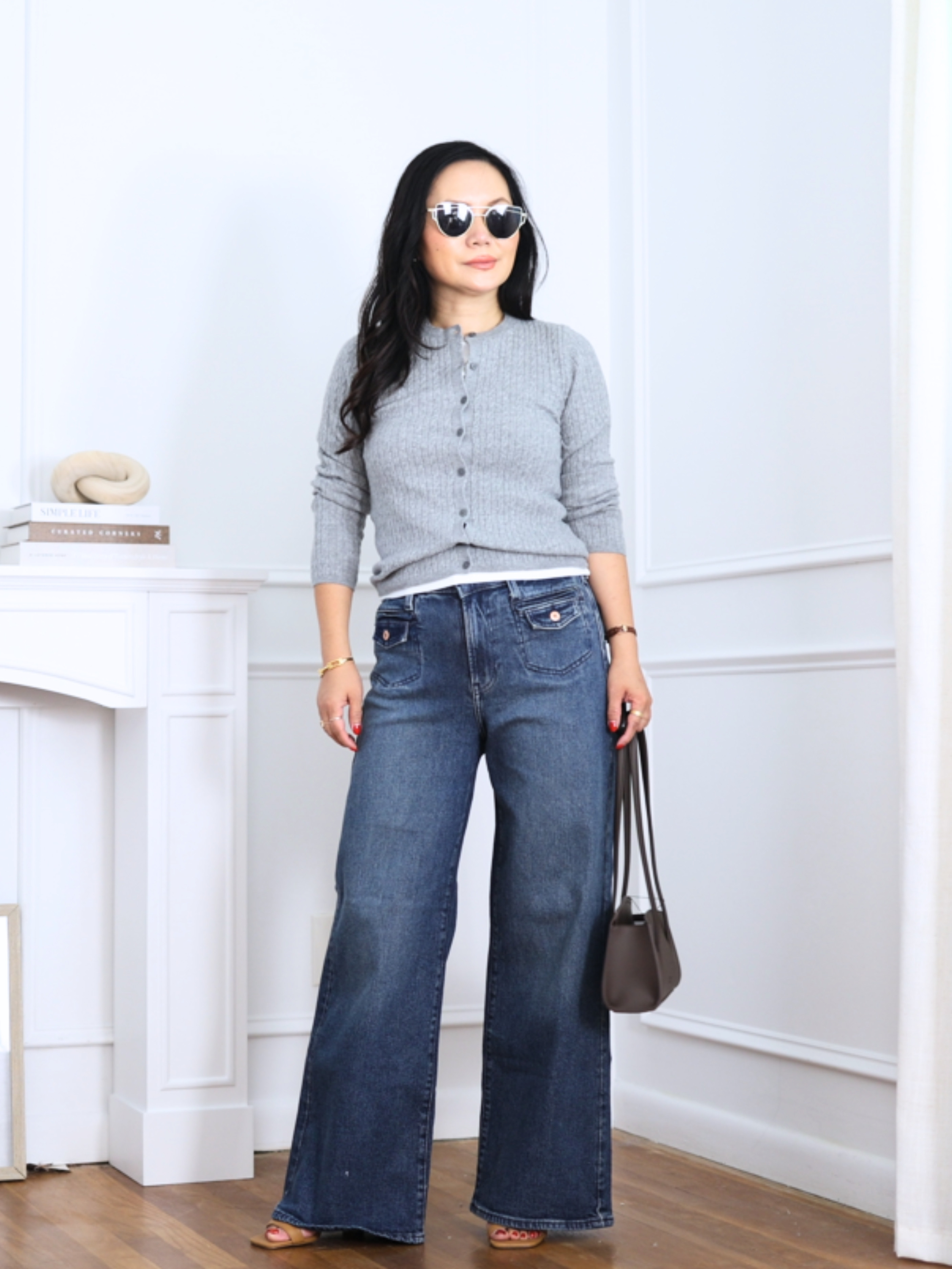 This UNIQLO sweater is such a good length for petites. I love that it hits around the waist, so I don’t have to tuck in a ton of extra fabric. I’m wearing size XS.  Wearing with Gap wide leg jeans.
 

 #LTKSeasonal #LTKOver40 #LTKPetite