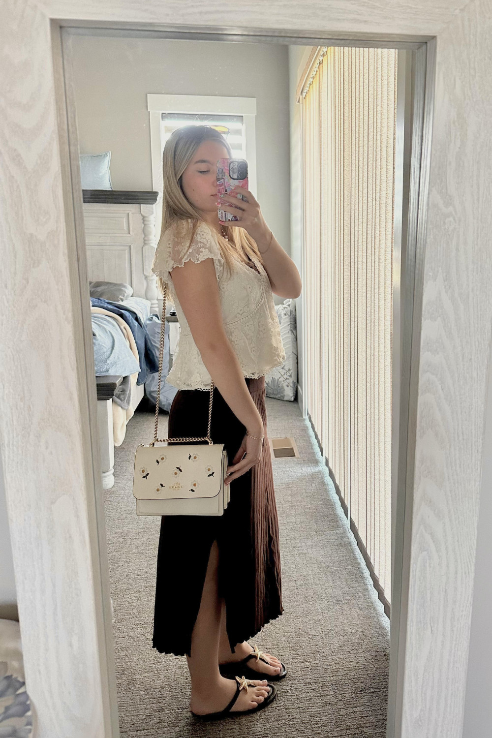 The perfect chocolate brown and cream outfit combo for the warmer months! 🤎 I am absolutely styling this romantic embroidered cream lace top with a pleated chocolate brown maxi skirt that features the most flattering side slit.

To complete the coastal boho look, I accessorized with this gorgeous cream Coach floral crossbody bag featuring a delicate gold chain strap and my favorite beachy gold starfish sandals. This whole look is so effortless, feminine, and perfect for your next summer vacation or weekend date night!

Everything is linked below—tap the products to shop my exact outfit and find similar pieces! 👇✨

#summeroutfitinspo #coastalboho #maxiskirtoutfit #coachbag #summersandals #bohochicstyle #LTKunder100 #vacationOOTD

#LTKgrwm #LTKootd #LTKSeasonal