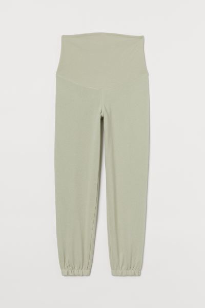 Sweatpant joggers in a lightweight organic cotton and recycled polyester blend. Wide jersey panel... | H&M (US + CA)